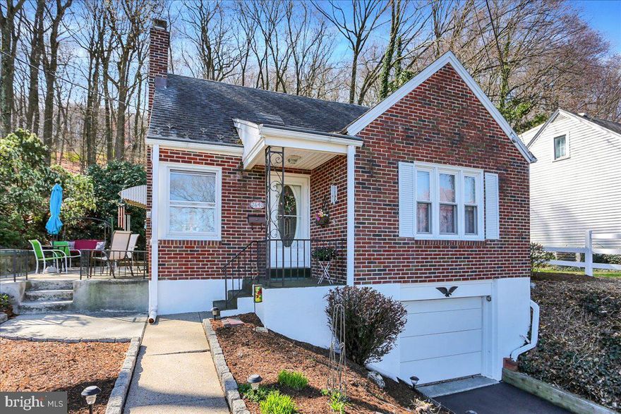 Charming Mt. Penn home with stunning city and Mountain views.  Welcome to this adorable and cozy 2 bedroom, 1 bath home nestled on a quiet hilltop in Mt Penn, offering beautiful views of the city and the mountains. Step inside to find a traditional floor plan featuring a formal living room and dining room with gleaming hardwood floors. The galley-style kitchen features upgraded countertops, a gas stove, refrigerator and easy-care vinyl plank floors. The main floor hosts a comfortable bedroom and a full bath with a tub/shower combination. Upstairs you'll find a spacious second bedroom and sitting room perfect for a home office, reading nook, or creative space. The full basement offers laundry, built in shelving and convenient stairglide, for easy access, plus outside exit.  Enjoy year round comfort with natural gas forced air heat , central air and an additional window unit A/C upstairs.  Set back on a wooded hillside, the property features a 1 car garage with opener, and a peaceful patio area with a swing and lots of closet space.  All appliances and the generator is included in the sale.  ( Please note: the electric FP in the LR does not remain and the DR chandelier will be replaced with a light fixture.  Don't miss your chance to own this delightfulhome with character, comfort and scenic charm.