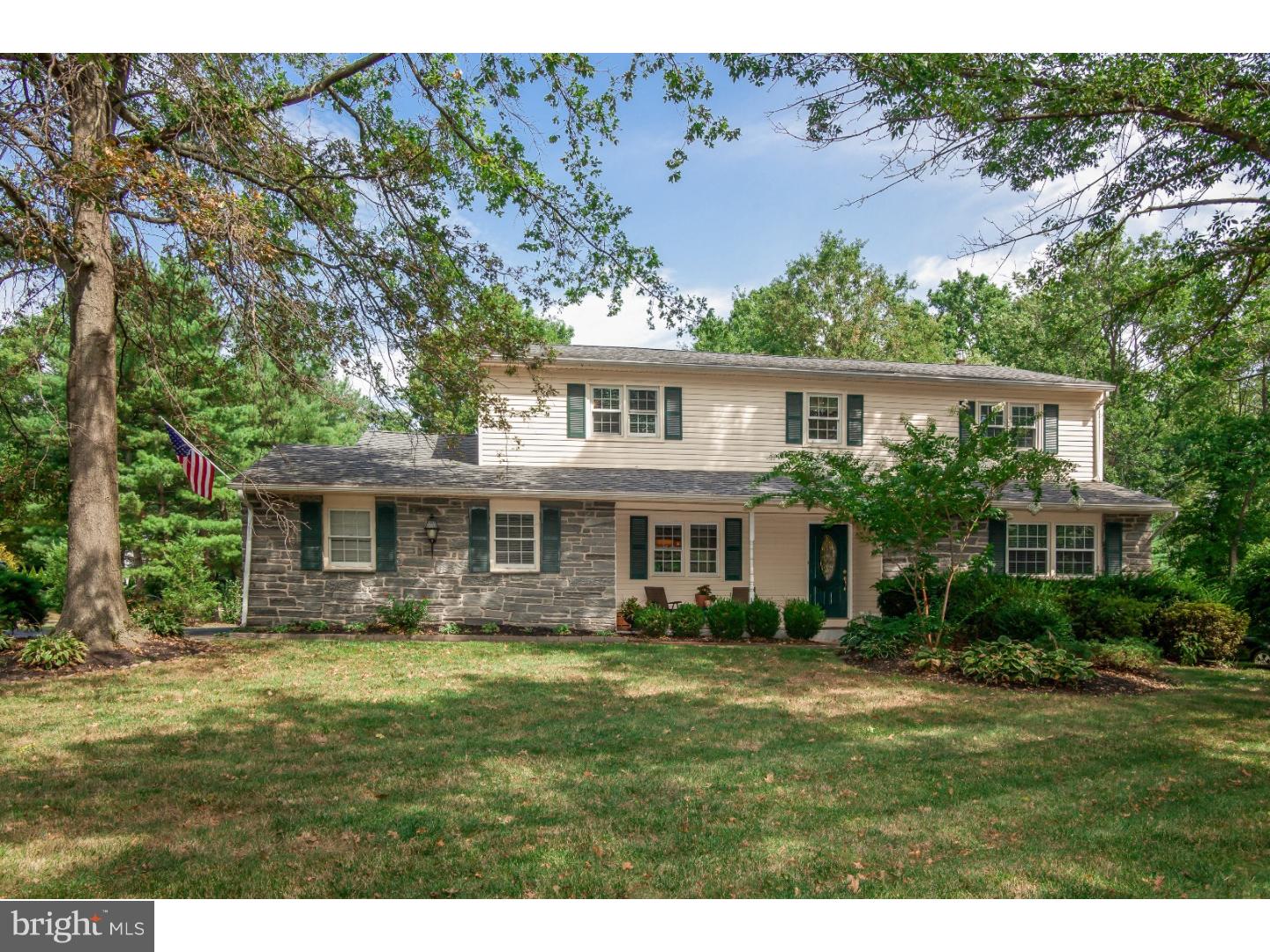 This remarkable 4-bedroom 2.5 bath Colonial in Lower Makefield has it all. This owner has made a remarkable number of upgrades in most recent years, including a phenomenal gourmet kitchen with an abundance of rich maple cabinets, tumbled tile backsplash, granite counters, stainless steel appliances and ceramic tile floor. There are gleaming hardwood floors throughout the house, an elegant curved staircase, and a stunning chandelier that hangs down from the second story. This home has been meticulously maintained both inside and out. At the front door, there is a quaint front porch that is so welcoming and large enough for chairs and table. The foyer entrance has a large walk-in coat closet and is center to the dining room and the office, which was formally the living room. In the rear of the home, a newly carved archway above granite-covered cabinetry with built-in wine cooler connects the kitchen to a fantastic family room complete with wood burning fireplace (recently relined) and decorative wall shelving on either side. Up the stairs is a wide and generously spaced hallway with two deep closets. All bedrooms have ceiling fans and are nice in size, and the two baths have newly installed vanities and toilets. To complete this home, there is a huge finished basement with a separate room (large enough to be a guest room), and plenty of extra storage space. Outside, in addition to the two car garage with additional 4 car driveway parking, there is a lovely covered back porch perfect for relaxing and entertaining. A new roof (2015) and re-stuccoed chimney (2014), and large tree-lined backyard complete the package. This home has so much to offer, and is ideally located close to I-95, Rt. 1, train stations, and shopping, and within walking distance of the local elementary school as well as to downtown Yardley. It also is a part of Makefield Lakes Association, which allows you to enjoy the activities at Silver Lake and all the beauty, tranquility and community spirit it offers!