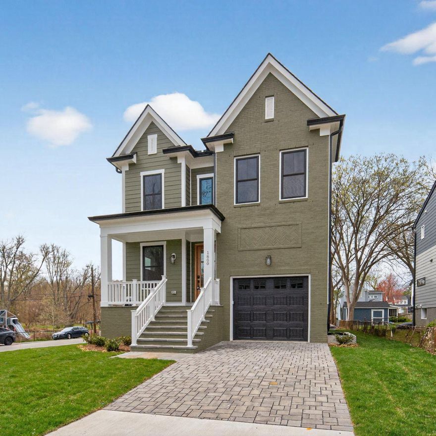 Welcome to this stunning new Craftsman home, expertly built by The Wormald Companies—renowned for over 50 years of excellence in custom home construction and backed by a comprehensive warranty program. Ideally situated just one block from the East Falls Church Metro, mere steps from the W&OD Trail, and directly across from Benjamin Banneker Park, this exceptional residence offers both convenience and natural beauty in a sought-after location. Set on a generous 7,500 sq ft lot, this home features approximately 4,375 sq ft of beautifully finished living space across three expansive levels. The exterior showcases striking Hardie Cedarmill siding and brick in an eye-catching Mountain Sage color palette, complemented by inviting covered front and rear porches, a rear deck, and an attached garage with a rough-in for an electric car charger. Inside, the thoughtfully designed floor plan offers 5 spacious bedrooms and 4.5 bathrooms with premium finishes throughout. Highlights of the main level include: wide-plank hardwood flooring; a private home office; an expansive great room with a gas fireplace; and a spectacular gourmet eat-in kitchen with a large island, creamy quartz countertops and cabinets, and top-of-the-line Bosch stainless steel appliances. The luxurious upper-level primary suite features dual walk-in closets and a spa-inspired bath. Three additional bedrooms finish out the upper level, along with a conveniently located laundry room. The fully-finished lower level is designed for both relaxation and entertainment, offering a spacious rec room with wet bar, a dedicated exercise room (or theater room), and a fifth bedroom with a full bath. Located within the desirable Tuckahoe Elementary, Williamsburg Middle, and Yorktown High School pyramid and offering easy access to I-66, this home is perfectly positioned for modern living. **Finishing touches going in now. Easy to see. Inquire today for further details. Photos are not of subject property. **