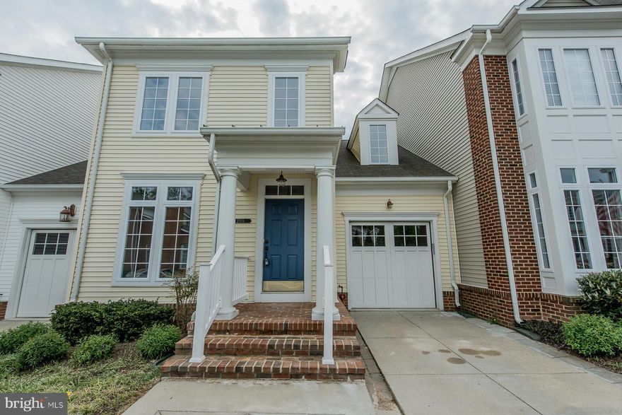 Backing to trees and open space, this villa townhome in Ellicott Hills features gleaming hardwood floors, decorative columns, crown & chair rail moldings & a soft color palette throughout! Kitchen w/granite counters, SS appliances, breakfast area & island. Family room w/ vaulted ceilings, cozy FP & sliding glass doors accessing the enclosed deck. Fin LL w/fresh carpeting & paint. Move in ready!