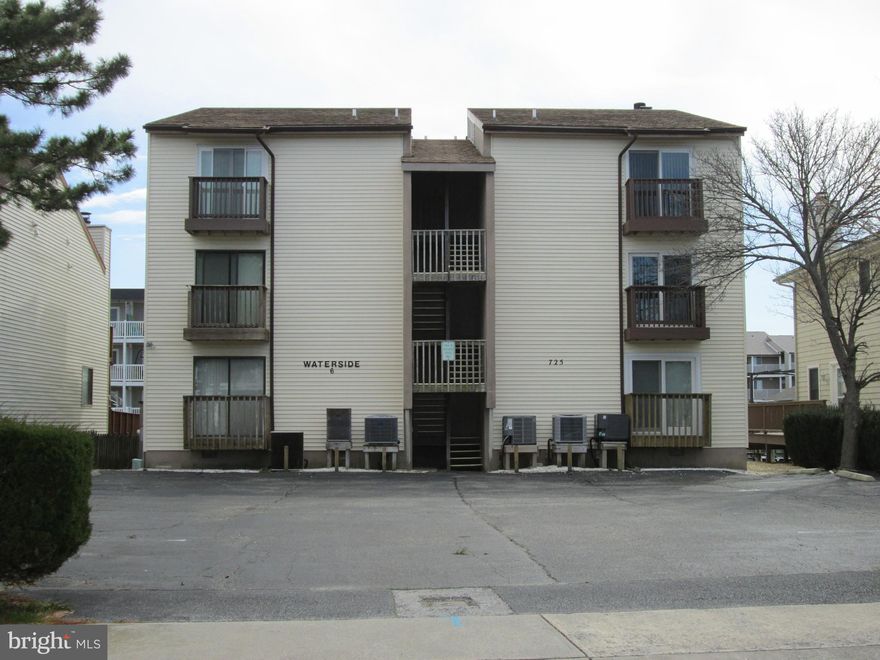 If you've dreamed of owning a place on the bay that is inexpensive and offers boat access and excellent water views...well your dreams just came true.  This sharply updated 2 bedroom, 2 bathroom property is in a small 6 unit building on the water.  It offers newer furniture, updated bathrooms, new carpeting, new interior doors, new sliders in the living room, new garbage disposal and a brand new deck off of the living room that opens out to the bay and provides some very nice views of the water.  The property comes with 5 community boats slips for your boating pleasure.  Very low condo fee of only $125 per month.  This vacation property  also offers a revamped and renovated fireplace for those romantic cooler evenings at the beach.  Sold fully furnished .  Very close to the 94th street shops and restaurants.  Easy to show, so take a close look to see what this charming property has to offer before it's gone.