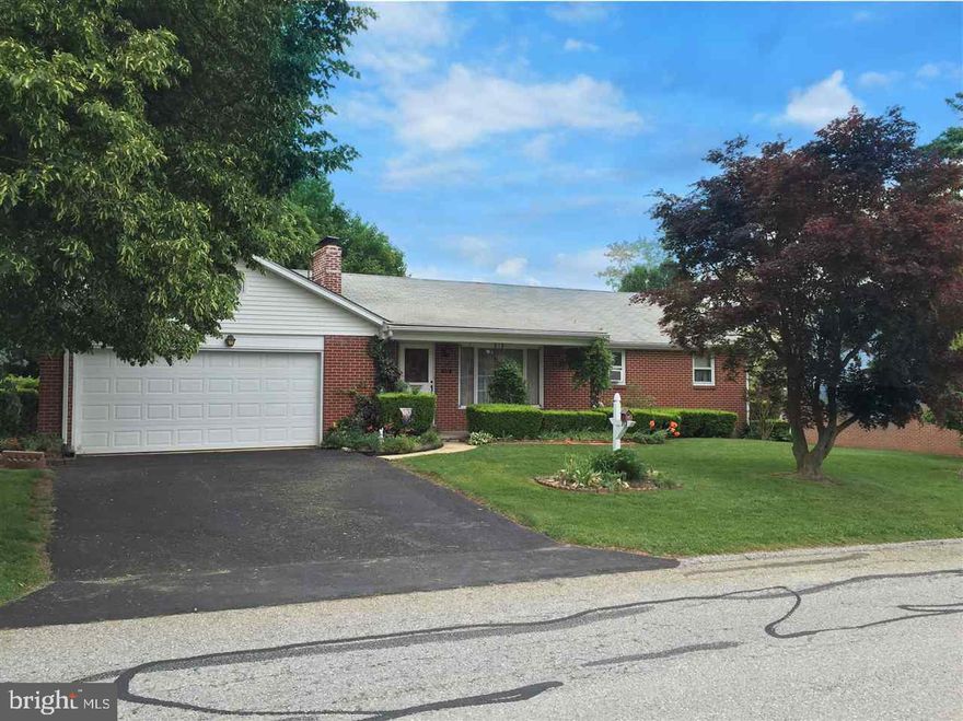 Solid well built brick rancher that is located in a great spot!  Close to I83, well maintained homes surround the area and a lovely mature back yard!  Classic features include brick fireplace, hardwood under carpet, and open rec room in basement.  Home needs updated and is priced accordingly.  Great vision can be realized here at the home!  2 car garage too!