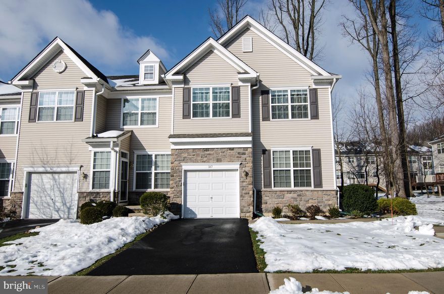 Location, Location, Location! Welcome to this beautiful home in a desire community. This End Unit Townhome offers you an Open floor plan  with Formal dinning room and Family room where lead you into gorgeous two story Living room and Kitchen. Right from the kitchen is a sliding door to the rear deck where you can sit and enjoy garden view. The hardwood floor is on entire the main floor. Also there is a upgraded powder room. On the second floor you will find a cozy  Master Bedroom with beautiful cathedral ceiling , spot lights and big windows which it gives you a lot of natural light. The  Master Suite has  double closets, fully ceramic bath with expanded stall shower and two separate vanities. Down to hallway two spacious bedrooms with plenty of closets and spot lights.  Also there is another Full Bathroom with Shower and Soaking tub completely fitted with frameless glass door enclosures. . The  Laundry Room is on second  level with a built- in  sink , the washer and dryer. The Basement is Fully finished with tile floor and Full Bathroom. Also it has a separate room which it can be your office. The Water heater was installed in 2018. The house has Water Filtration System. It was installed in 2013 and it has a warranty. Great Location is close to everything : shopping, restaurants, movie theater, gym and more. Welcome to this beautiful house and you will feel yourself like home!!!