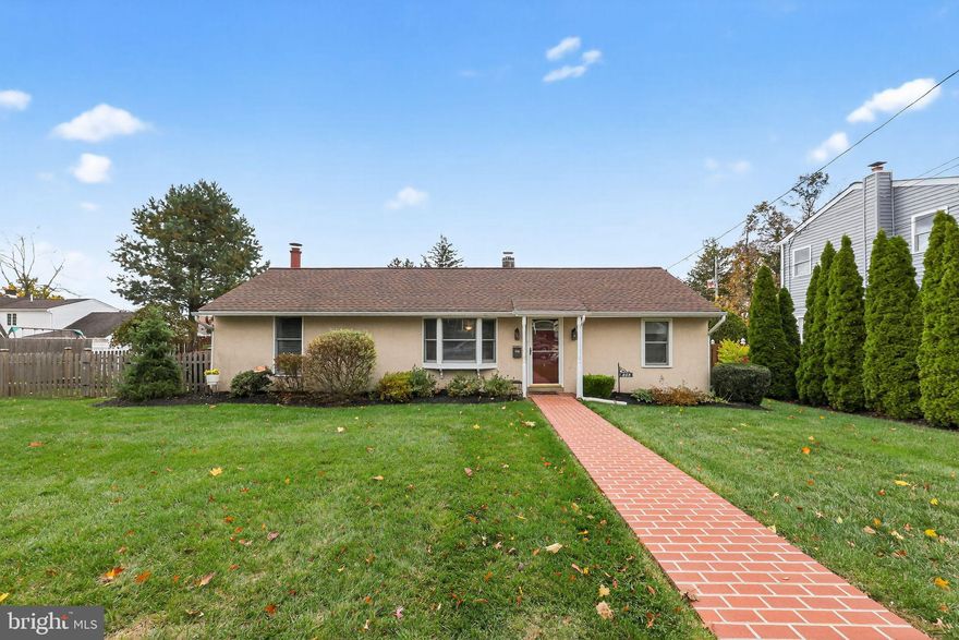 A Rare Offering in North Wales Borough — Welcome to 408 Fairview Avenue and experience timeless charm and modern comfort in this one-of-a-kind residence situated on one of North Wales Borough’s most sought-after lots, extending gracefully from Fairview to Highland Avenue. From the moment you arrive, the meticulously manicured grounds, classic brick walkway, and inviting curb appeal set the stage for something truly special. Step inside to discover a beautifully updated living room showcasing premium hardwood flooring, a large bay window, and a warm, welcoming ambiance.  Two well-appointed bedrooms are located just off the main living area. The primary suite features an elegantly updated tile bathroom, while the second bedroom offers flexibility as a home office, guest room, or nursery.  The chef-inspired kitchen is designed with both style and function in mind — boasting granite countertops, custom wood cabinetry, and tile flooring. The adjacent formal dining room exudes charm, highlighted by a cozy fireplace perfect for hosting memorable dinners and holiday gatherings. Continue into the spacious family room, where abundant natural light, panoramic windows, and a Vermont Casting gas fireplace with a fully remote-controlled thermostat create an inviting atmosphere for relaxation or entertaining. Every detail has been thoughtfully maintained — simply move in and enjoy. Through the sliding glass doors, step onto the expansive Trex deck complete with an automatic retractable sunset awning and a brick paver patio, overlooking a professionally landscaped, fully fenced backyard—an ideal setting for relaxing or entertaining outdoors. Two detached sheds provide additional value — one for storage, and the other a heated workshop with its own covered porch, ideal for hobbies or creative pursuits.  Both sheds have working electric. This property offers the rare combination of Location, Value, Condition, and Affordability — a true standout in today’s market. Perfectly positioned near major roadways, public transportation, shopping, and dining, 408 Fairview Avenue captures the best of small-town charm and modern convenience.