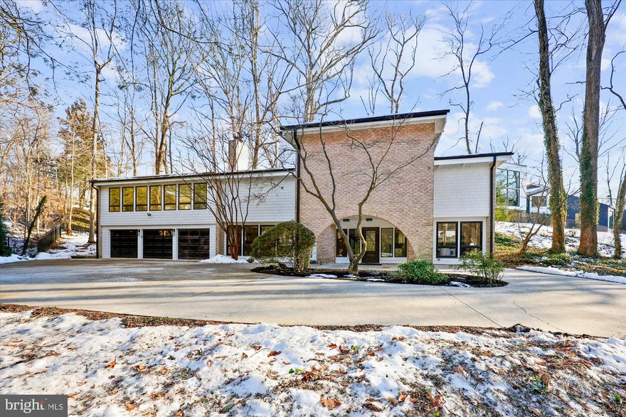 Welcome to this contemporary and breathtaking home in the prestigious Bannockburn Community.  As you drive up to this wonderful property, you can appreciate the tranquility and privacy, offered! The private gate leads to a unique and large driveway, with an undercover parking and three car garage.  This home is ideal for entertaining from the open space between the living room and dining room, and the gourmet kitchen with access to a stone patio.  As you walk through, you will appreciate the fine details throughout and walls of windows with gleaming natural light and a view to this to glorious nestled property. Upstairs you have 4 bedrooms, 3 full bathrooms with two great rooms, ideal for a family room or playroom. From there, you have a large studio or work room with a private entrance. In the back yard, you have a detached two level building, perfect for storing on the first floor and a studio on the second floor.  This home has it all! Come and take a look for yourself.