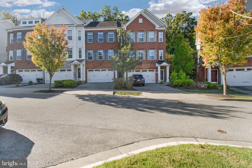 OPEN HOUSE SATURDAY, 11/8 FROM  12:30-2 PM!!  Come and see the BEST VALUE IN THE AREA!!  Discover the perfect blend of comfort, style, and convenience in this stunning three-story brick townhouse located in the sought-after Westphalia Row community.
From the moment you arrive, you’ll appreciate the thoughtful design and modern touches that make this home truly special. Enjoy the ease of a two-car garage with interior access, keeping you protected from the elements year-round. The finished entry level offers endless possibilities—whether you’re looking for a home office, recreation room, or future guest suite with plumbing ready for a full bath. Step outside through the sliding glass doors to your brand-new patio, ideal for relaxing or entertaining.
The main level features an open-concept design with gleaming hardwood floors and a gourmet kitchen—perfect for everyday living or hosting friends and family. Prepare meals while staying connected to the spacious living and dining areas filled with natural light.
Upstairs, retreat to a bright and airy primary suite complete with a soaking tub, separate shower, and generous walk-in closet. Two additional bedrooms and a full bath provide plenty of space for family, guests, or a dedicated home office.
Living here means more than just owning a home—it’s a lifestyle. Your backyard opens to serene trees, while a beautiful park sits just across the front yard, creating a perfect balance of nature and neighborhood charm.
Westphalia Town Center offers an urban-suburban lifestyle, designed for walkability and community connection. Enjoy nearby shopping, dining, parks, schools, and convenient access to major routes—ideal for commuters to Andrews Air Force Base and Washington, D.C.
Come experience all that 9521 Westerdale Drive and Westphalia Row have to offer. You’ll love calling this place home.