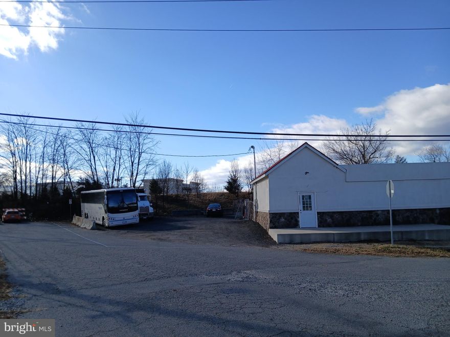 Approximately 4,000 square foot building but the primary value is in the 1.72 acres made up of four connected lots right on Atlantic Boulevard is Sterling, VA, 20170 at the signalized intersection with Ruritan Circle. Very close to the intersection of Atlantic and West Church Road. Rectangular shaped parcel that is in between Atlantic and Ruritan with access from Ruritan. New commercial construction across Atlantic from the subject property in this growing area.
