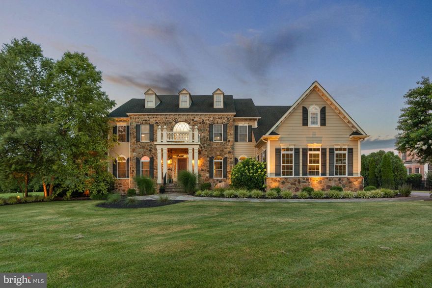 Absolutely stunning 3-car garage stone front colonial in sought after Walnut Grove, Clarksville zoned for premium River Hill schools! Must see outdoor living w/heated, salt water gunite pool w/multiple waterfalls, cascading whirlpool spa and tanning ledge. A designers dream screened in porch w/built-in quartz bar, wood fired pizza oven, built-in 6-burner grille, sink w/hot and cold water, dual refrigerators, wood or gas stone fireplace, multiple outdoor heaters, wood ceilings, recessed lighting, multiple TVs and 7 retractable screens opening to the travertine deck, patio, sports courts, garden and fenced-in rear yard. Indoors there is approx 10,000 sq ft of space w/extensive upgrades including: a grand 2-story foyer w/dual curved staircases; gleaming hardwoods; gourmet kitchen w/chef grade Viking and Sub-Zero appliances, granite, and custom 42" cabinetry; family room w/gas fireplace, custom built-ins, coffered ceilings and double French door sliders opening to screened-in porch; bright conservatory and morning room; separate dining room w/custom bar, dual sub Zero beverage refrigerators and built-in wine rack; huge walk-in laundry room w/granite counters and custom cabinetry; two powder rooms on the main level; upper level w/6 generously sized bedrooms and 5 full bathrooms; primary bedroom w/sitting room, tray ceilings and multiple walk-in closets; spa like primary bathroom w/whirlpool soaking tub and glass walk-in shower w/multiple heads and body jets; home theater area w/built-in bar seating and wet bar; home gym w/glass doors and rubber floors; multiple bonus rooms and storage rooms; 3 zone gas and electric HVAC; lawn irrigation system and extensive landscaping; hardiplank siding; fully owned solar panels generating on average approx 16,000 kwH per year, essentially eliminating an electric bill. Please see photos and video tour for extensive details.