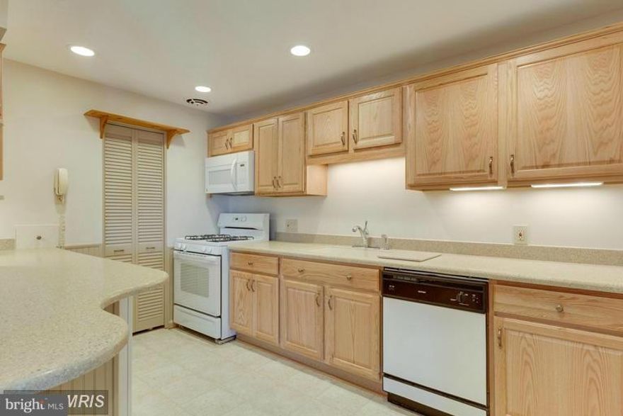 Beautifully renovated Occoquan condo with 1371 SF! Features a large den, tastefully remodeled kitchen in 2014, fresh paint 2015, FULL SIZE washer/dryer in unit, upgraded Windows & HVAC, abundance of closets and extra storage in basement. Community pool, walking distance to Downtown Occoquan and transportation. Assigned parking with many visitor spots. This is a MUST see!