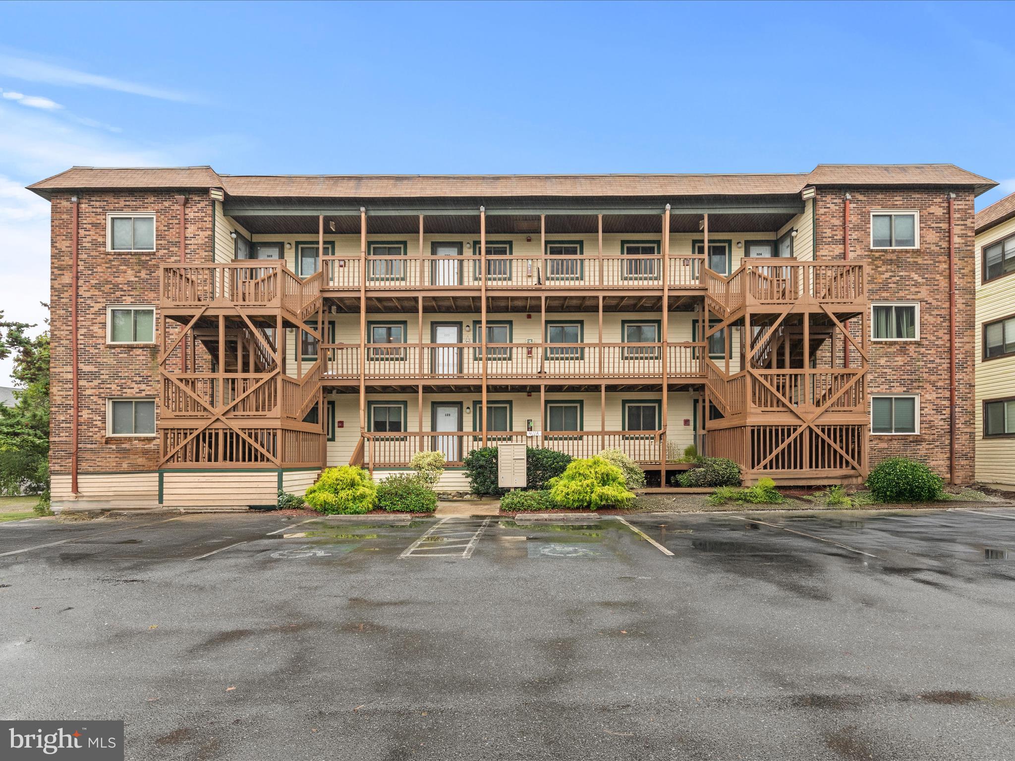 Welcome to 411 146th Street, Unit 323, a charming coastal retreat tucked away in North Ocean City, just blocks from both the ocean and the bay. Perfectly situated, this condo places you within easy reach of local favorites for dining, shopping, and entertainment, making every day feel like a vacation.
Step inside to find an inviting beachside haven designed for relaxation and ease. The open floor plan centers around the living room, where an airy, light-filled layout creates the ideal setting for gathering with family and friends. The kitchen is thoughtfully designed with ample counter space, generous cabinetry, and a peninsula that doubles as a breakfast bar, perfect for casual bites between beach outings. Just beyond, the dining area provides a welcoming spot for intimate meals or lively evenings.
The primary bedroom offers a serene retreat, complete with a private ensuite bath and direct access to the back balcony, a peaceful perch to sip your morning coffee or unwind with a glass of wine. A spacious guest bedroom and full hall bath provide comfort and convenience for visiting guests, while a discreet laundry center enhances everyday ease. Offered furnished, this condo is move-in ready and perfectly suited as a second home, weekend getaway, or beachside investment. With its desirable North Ocean City location and effortless coastal charm, Unit 323 is simply the perfect place to start making memories by the shore.