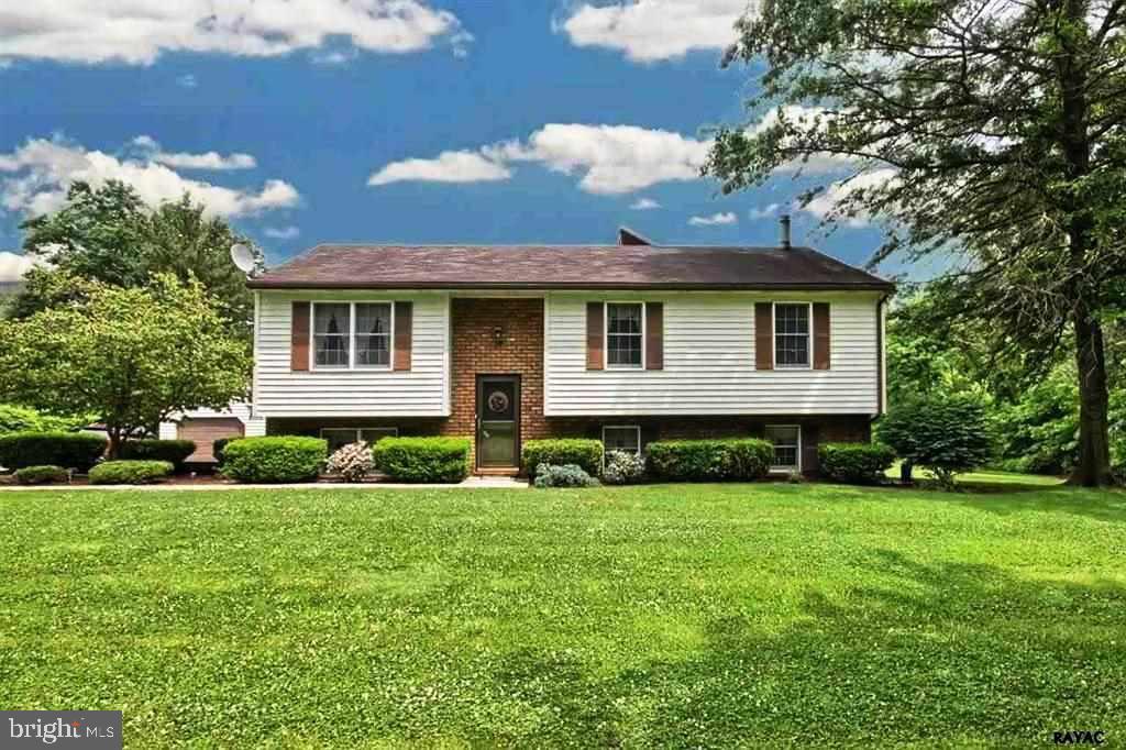 Country Charm describes this beautifully manicured home. Relax at the end of the day on the deck or patio. This home is move-in ready!