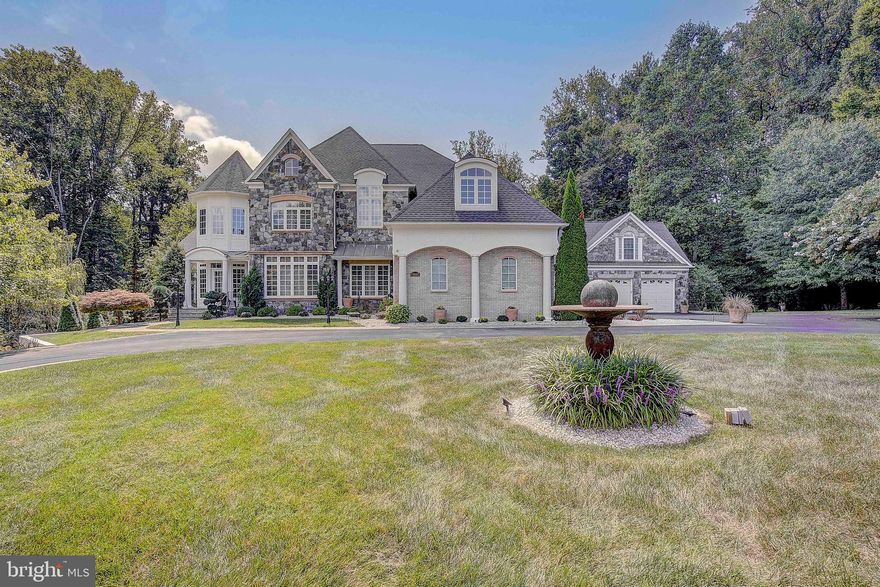 *Back up offers welcome *  Call us TODAY to schedule your personal walkthrough!  

Welcome to the pinnacle of luxury living in Upper Marlboro, Maryland, where elegance and sophistication merge seamlessly with the joys of spacious suburban living. Nestled within the prestigious cul-de-sac at 13503 Fendall Court, this remarkable 10,000 square foot estate offers an abundance of exquisite features and amenities.

Situated on a sprawling 4-acre lot, this property provides both space and privacy. Two acres of the land are expertly fenced with wrought iron fencing, enhancing security while adding a touch of elegance to the  meticulously landscaped grounds.

Seller says make your offer today!   This magnificent home that was built by Mid-Atlantic with all of the upgrades available, a few miles outside of Washington DC.  The Venezia model features a huge main home with a breezeway to the side attached to an extra garage with au pair suite.  

As you drive into the cul-de-sac, you’ll see the wrought-iron security gates and fencing that surrounds a good portion of the property (about 2 acres with a ravine on either side)  and the lovely curb appeal.  There is commercial exterior lighting surrounding the property.   The main home has an attached, side-load, 3 car garage.  

The inside features over 10,000 square feet of living space with a possible 8 bedrooms (including the suite above the detached garage) and 6 full bathrooms, making it the perfect multi-generational home.    It's very large, but the design makes it feel more intimate and comfortable.  The main level has a massive gourmet, eat-in kitchen in which the whole family will find themselves gathering, located right off the deck.  It's adjacent to the separate 2-level living room with fireplace, spacious office, and side family room.  Off this level is a deck that spans the width of the home, overlooking the backyard.  

Upstairs you’ll find 4 bedrooms in the main home, each with an en-suite bathroom, including an incredible owner’s suite with walk-in closets, huge bathroom with soaking tub, dual vanities, and large glass block shower.  You’ll love the fireplace, tray ceiling, and private balcony off this suite.  There’s a full laundry room on this level.

The lower level is fully finished with an open recreation room, bar, exercise room, movie room with theater seating, large office with space for a conference room table, and your utilities.  There’s a full bathroom and separate laundry room on this level, which is convenient for guests and washing towels.

Two of these rooms could easily be used as bedrooms.  The gym could also double as a bedroom for a potential of 3 extra bedrooms in the lower level, which makes the space amazing for large or multi-generational families.

There’s additional living space in the au pair suite above the detached 2 car garage, which has it’s own kitchenette, bathroom, and separate laundry.

Outside is an entertainer’s paradise.  It was specifically designed so you can work during the day in DC, then come home and feel like you're at a resort!   The backyard feels like a resort with the large decks, beautifully manicured property and pool.    There's a  large deck on the main level, with 2 awnings, separate deck off the owner’s suite, and paver patio on the lower level, running the width of the home.  The heated saltwater pool is 16 feet at the deepest point under the cement slide, and has a swim-up bar at the opposite end, with built-in seating, overlooking the outdoor kitchen.  There’s an attached generously sized hot tub, and plenty of decking for your table and chair sets.  

Make sure to download the feature sheet; there’s literally every bell and whistle that you can imagine in this incredible home.  Call today for your private showing.