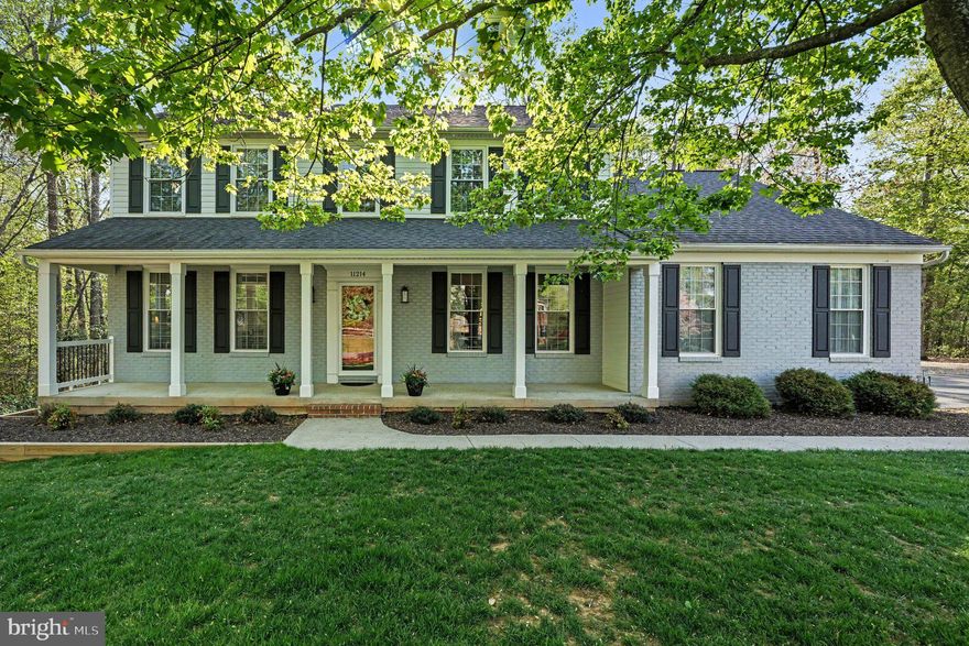 Located in the desirable Spring Lake Estates neighborhood, this immaculate modern country estate is everything buyers dream of. Set on a gorgeous 1.08-acre lot with a flat, open backyard surrounded by mature trees, this home offers the perfect combination of privacy, beauty, and space.

From the moment you step inside, the home makes an impression with its grand two-story foyer, abundant natural light, rich dark hardwood floors, and exceptional condition. Meticulously maintained and truly in mint condition, every inch of this home feels fresh, pristine, and move-in ready. A spacious attached two-car garage adds everyday convenience.

The spacious, open floor plan was designed for both everyday living and entertaining. The beautiful kitchen features granite countertops, stainless steel appliances, and abundant cabinetry, all opening seamlessly into the family room. Just beyond, the living room offers a cozy gas fireplace, creating the perfect space to gather and unwind.

One of the standout features of the home is the screened-in porch just off the family room. Overlooking the expansive backyard, it is the perfect place to enjoy your morning coffee, relax at the end of the day, or entertain while taking in the peaceful views and surrounding natural beauty.

The backyard is truly exceptional—flat, open, and framed by mature trees, creating a private outdoor retreat with plenty of room to play, garden, entertain, or simply enjoy your own backyard sanctuary. A spacious detached shed provides excellent additional storage for lawn equipment, outdoor tools, and all of your gardening and yard essentials.

The fully finished walkout basement provides incredible additional living space with a spacious rec room, bonus room, and full bathroom—ideal for guests, a home office, gym, or playroom.

Spring Lake Estates offers a lifestyle that is hard to find. Enjoy walks around the neighborhood pond or bring your fishing rod and spend the afternoon fishing. Residents also have the option, for an additional annual fee, to enjoy neighboring gated Dugan Park, which features a walking trail, playground, pavilion with picnic tables, kayak and canoe rack, dock, deck, and water access to the Occoquan Reservoir. Boats with engines under 10 horsepower are permitted.

All of this is conveniently located just minutes from shopping, dining, I-95, I-66, and more—offering the perfect balance of peaceful living and convenience.