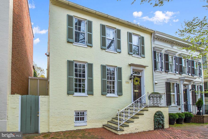 Charming semi-detached house in the heart of Georgetown boasting a wonderful garden w/ large swimming pool. This 4BR/3.5BA home features hardwood floors, beautiful moldings, & is flooded w/ natural light throughout. The main level features a spacious dining room, separate kitchen, & light filled living room w/ access to sunroom overlooking the rear. The lower level has an additional two bedrooms.