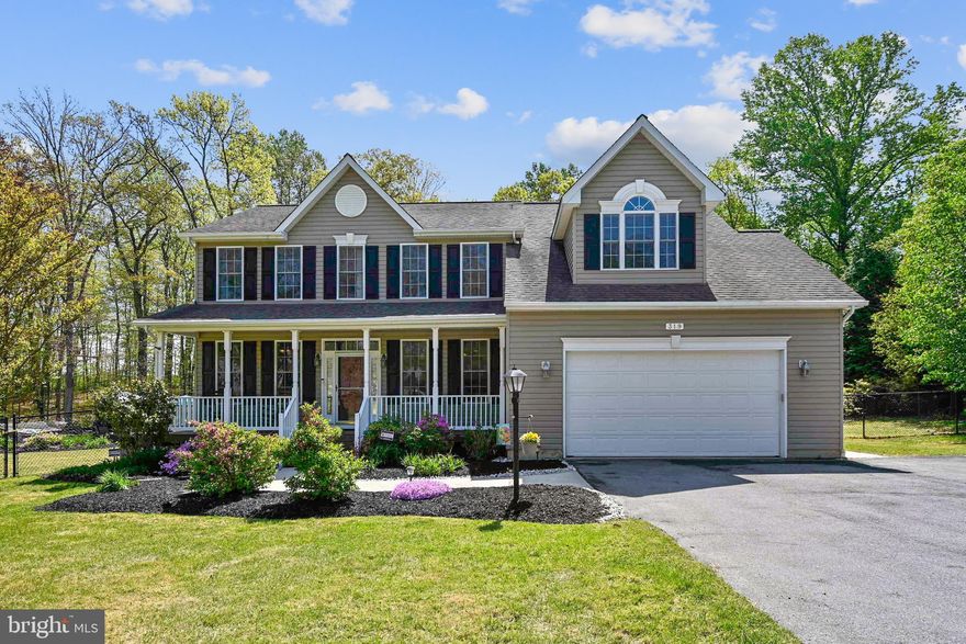 This gorgeous 4BR/3.5BA colonial sits on 2.19 acres!  Make sure you go down the right driveway!  The house will be on the left.  You will have before you a large colonial with attached, oversized, two car garage. The beautifully landscaped front yard leads up to the porch, where you can picture yourself porch-sitting with a tall glass of lemonade. Upon entering into the house you will have a formal living room or office or whatever you choose, on your left.  To the right you will find your formal dining room. When you go down the hallway, you will see your kitchen, breakfast room and another gathering area. But wait!  There's more!  How about a huge family room that lets out to a screened in porch, that lets out to your above ground pool.  There's lots of landscaping going on out back as well. You will see that a good bit of the property has been fenced. You will find a playground and a little playhouse (with air conditioning)  or she shack!  The bedrooms are generously sized, especially the primary ensuite.  Can you use a 20'x15' bedroom?  The basement is finished as well.  It has a full bath, storage areas, even a room that could be used for school, studying or an office.  Did I mention the whole house generator? You really need to take a look to appreciate this wonderful property! It may be tucked away, but it's close to many major road arteries, as well as a hop, skip and a jump away from  Ft. Meade and NSA!  Make your appointment today!