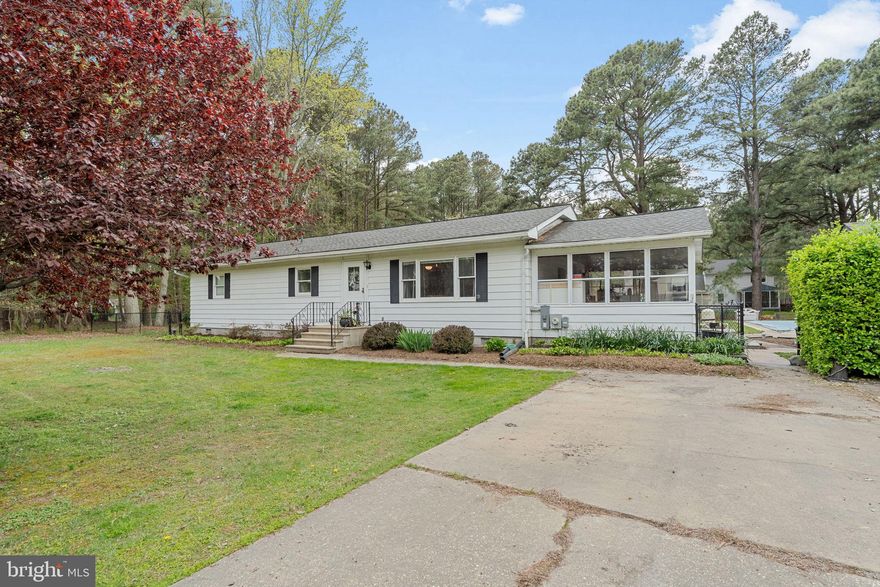 Welcome to 132 Pennick Drive in Stevensville, where easy one-level living meets the relaxed charm of a water-oriented community. This lovely rancher offers a thoughtful layout with two spacious bedrooms featuring their own ensuite bathrooms, plus a third bedroom and a full hallway bath, giving everyone their own space and comfort. Inside, you will find beautiful hardwood and luxury vinyl plank flooring throughout, creating a clean and cohesive look that is both stylish and low maintenance. The brand-new kitchen, completed in late 2025, shines with modern finishes and all new appliances, making it the perfect place to cook, gather, and entertain. Practical updates bring peace of mind, including a recently re-dug well with excellent water output. Step outside and enjoy your own private retreat. The in-ground pool is ideal for summer relaxation, while the double lot provides extra space, privacy, and possibilities. A rear ramp offers convenient accessibility, making this home comfortable for a variety of lifestyles.  Located in a water-oriented community, this property combines the tranquility of the Eastern Shore with the convenience of nearby amenities. If you have been looking for accessible, single-level living with modern updates, outdoor fun, and room to breathe, this Stevensville gem is ready to welcome you home.