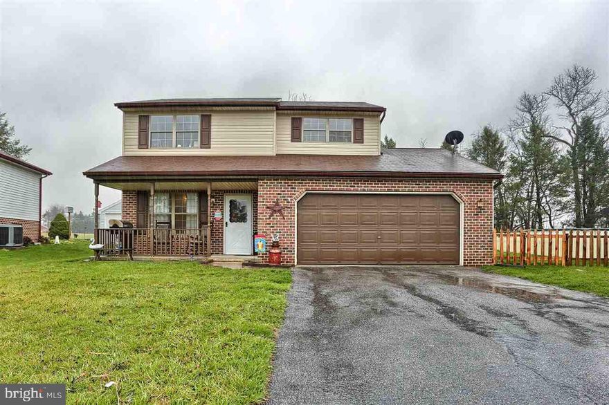 Don't miss this move in ready 3 bedroom, 2 full bath home in Locust Point with a 2 car garage,  a full bath on each floor as well as an updated heat pump and new flooring throughout 1st floor and 1st floor laundry. In addition, 1st floor laundry and a bonus room that leads to the fenced yard which backs up to farm land.