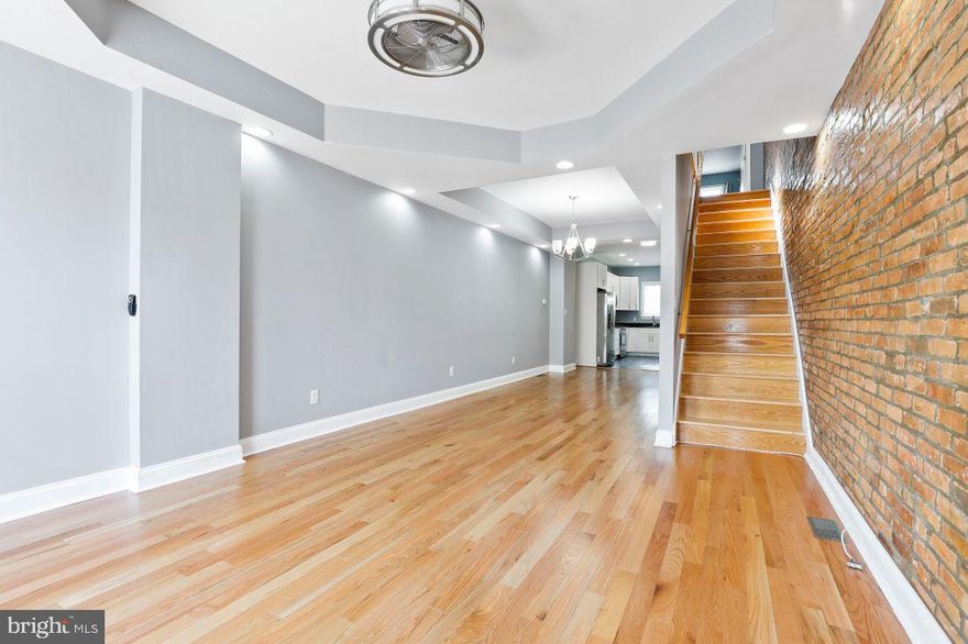 Don't miss out on this beautiful recently renovated 3 bed 3 bath home with PARKING. Exposed brick through out, stainless steel appliances with granite countertops. Fully finished basement. This home has it all. Schedule your showing today.