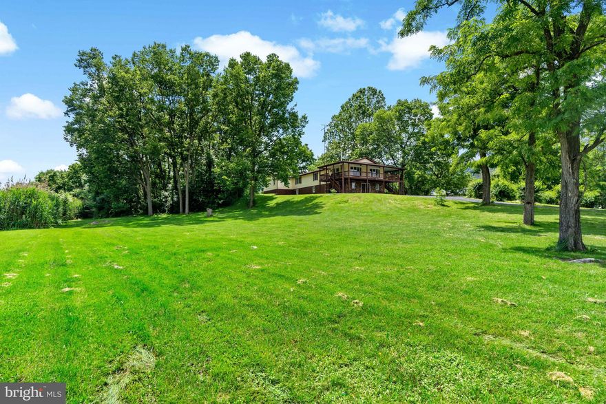 Charming Raised Ranch on 1.75 Scenic Acres – Just Minutes from Town!
Discover the perfect blend of country serenity and town convenience with this spacious 5-bedroom, 2.5-bath raised ranch nestled on 1.75 acres of pastoral beauty. Set in a peaceful rural setting on the outskirts of town, this home offers the privacy and tranquility of the countryside with easy access to local amenities.
Step inside to find an open and inviting layout featuring a generous living room and a beautifully updated kitchen with granite countertops—ideal for family meals and entertaining. A large family room provides plenty of space for gatherings, movie nights, or relaxing in comfort.
Enjoy sweeping views of the surrounding landscape from the expansive wrap-around deck—perfect for morning coffee, sunset dinners, or simply soaking in the peaceful surroundings.
This home also features a full basement for extra storage or future finishing, and a handicap-accessible ramp at the rear entrance for added accessibility.
Whether you're looking for room to grow, space to entertain, or a quiet country escape, this property delivers.

Highlights:

5 bedrooms | 2.5 bathrooms

1.75-acre lot with scenic, pastoral views

Handicap-accessible rear ramp

Spacious wrap-around deck

Granite kitchen countertops

Full basement

Just minutes from town

Don't miss your chance to own this rare gem in the countryside—schedule your showing today!