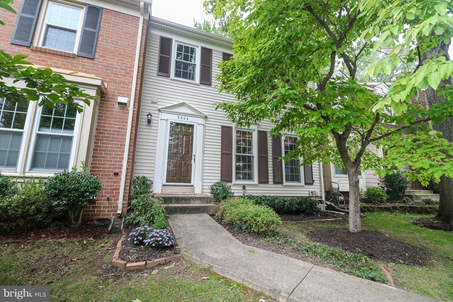 Walk to Metro * 3 fin level TH backing to trees * Hardwood floors on the main level * Updated kitchen with granite, stainless appls, backsplash & cabinets * Dining room leads to rear yard * Living room * Master suite * Updated baths w vanities & tile *  Finished lower level w rec room w fpl, laundry/storage * Fenced rear yard w deck * 2 reserved parking spaces *  Newer roof, siding and windows *