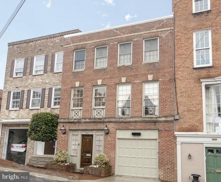 Rare opportunity with stunning views of the Potomac River and a GARAGE! This spacious 2BR, 3.5 BA plus den townhouse features elegant details and a large patio with expansive views of the river and Virginia. The luxurious master suite features a wall of custom cabinets, a fireplace and a HUGE walk-in closet before the large master bath. The home also features a great room with balcony.