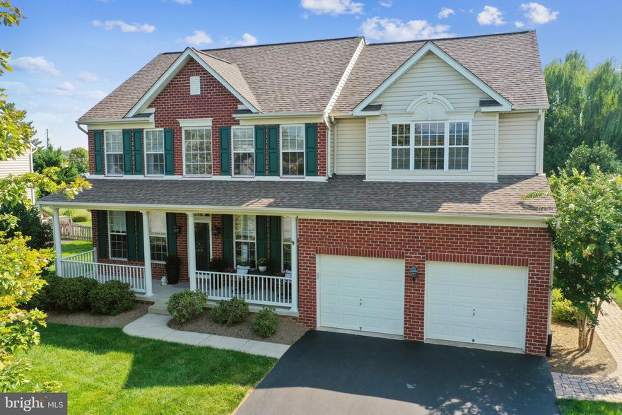 PRICE IMPROVEMENT! Stunning Green Hill Manor home in Adamstown – a commuter's dream location! This model-quality Ausherman-built home features 5 bedrooms, 3.5 bathrooms and over 4,500 sq ft of living space. The first floor features a formal living and dining room, 2-story foyer, home office with a view, and open-concept family room with gas fireplace. The kitchen comes equipped with granite countertops, large island, stainless appliances, and a wine bar. Upstairs you'll find 5 spacious bedrooms, including a master suite that is sure to please with a walk-in closet and beautifully appointed en suite with a claw foot soaking tub and glass stall shower. This impressive home also boasts a large walk-out basement with rec room, two bonus rooms and full bath for entertaining and extra guest space. Hardwood floors and fresh carpet run throughout. During the summer, entertain in style on the patio or relax near the heated salt water pool. This home also comes equipped with a built-in grill area, mature landscaping, fish pond, and fenced pool and yard. Located on a quiet street with a view of the mountains and nearby sports fields, in the highly-coveted Frederick County school district. This home is zoned for Carroll Manor Elementary, Ballenger Creek Middle, and Tuscarora High. Too many upgrades to list – this one is a must-see! (Update: pool is closing 9/24/21)