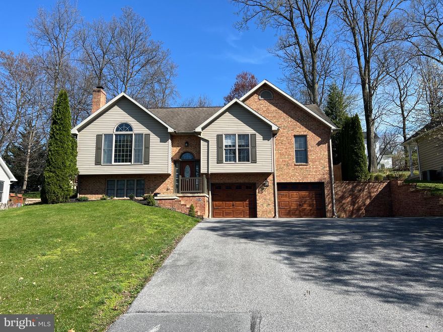 Beautifully updated split level home in the Penn National golf course community.  Current owners remodeled both bathrooms to include a walk in shower in the primary, new vanities in both, LVP flooring in the kitchen, dining area, laundry, and master bath, new heat pump/AC in ‘23, all appliances replaced in ‘22, fenced backyard in ‘21, window coverings custom fitted fabric cordless blinds in living room and 2 bedrooms, home was painted after purchase in ‘21. Main floor laundry room, sunroom and patio on the rear.  Wood burning fireplace in the living room.