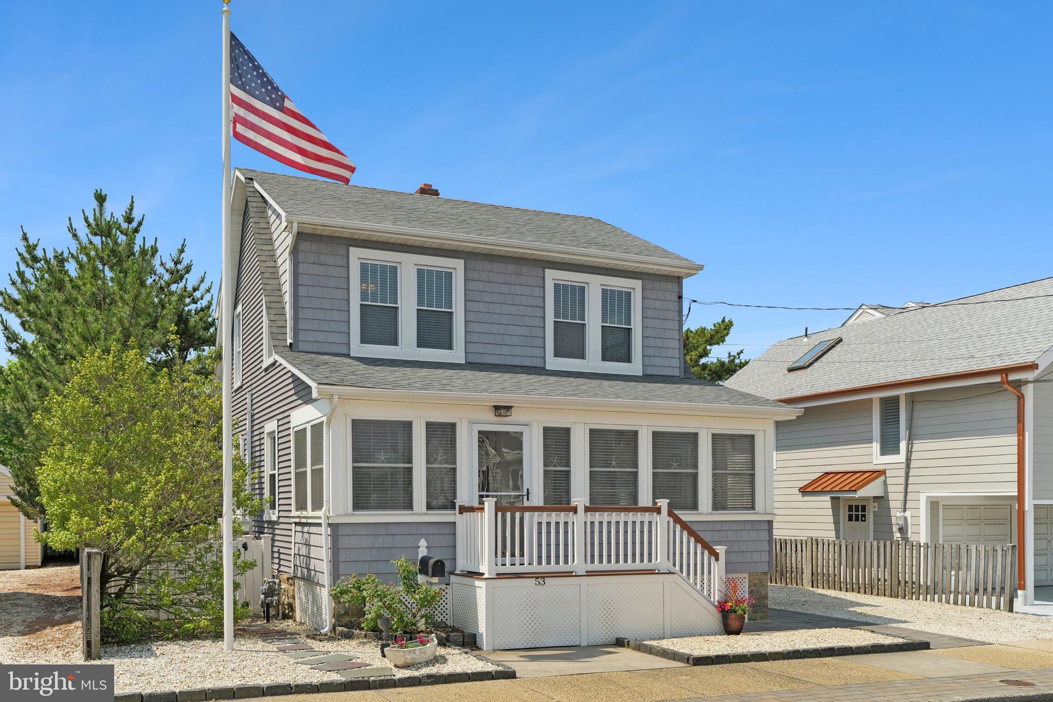 Just ten houses from the beach and five from the bay, this laid-back spot in Seaside Park makes summer feel like a year-round state of mind. A charming town, Seaside Park delivers the best of both coasts, allowing for sunrise strolls along the ocean, and sunset kayaks on the bay. Inside, this home carries the same easy energy as its laidback coastal location. Three bedrooms, a sun-filled living room, and an enclosed front porch set the tone for slow mornings and breezy afternoons. Hardwood floors give it a warm feel. The kitchen and bathrooms have been smartly updated, and a powder room and walk-in pantry sit just off the kitchen. There’s a home office tucked beside the dining room, perfect for meeting deadlines in flip-flops. Each room has its own mini-split unit, so everyone can adjust the temperature without a fuss, and ceiling fans throughout keep the air moving even when the sea breeze takes the day off. Outside, the completely redone gunite pool with a hot tub anchors the backyard, edged by a firepit for toasting marshmallows and a reimagined garage that now throws the best kind of party with a bar, mini fridge, and a flat-screen-ready setup!