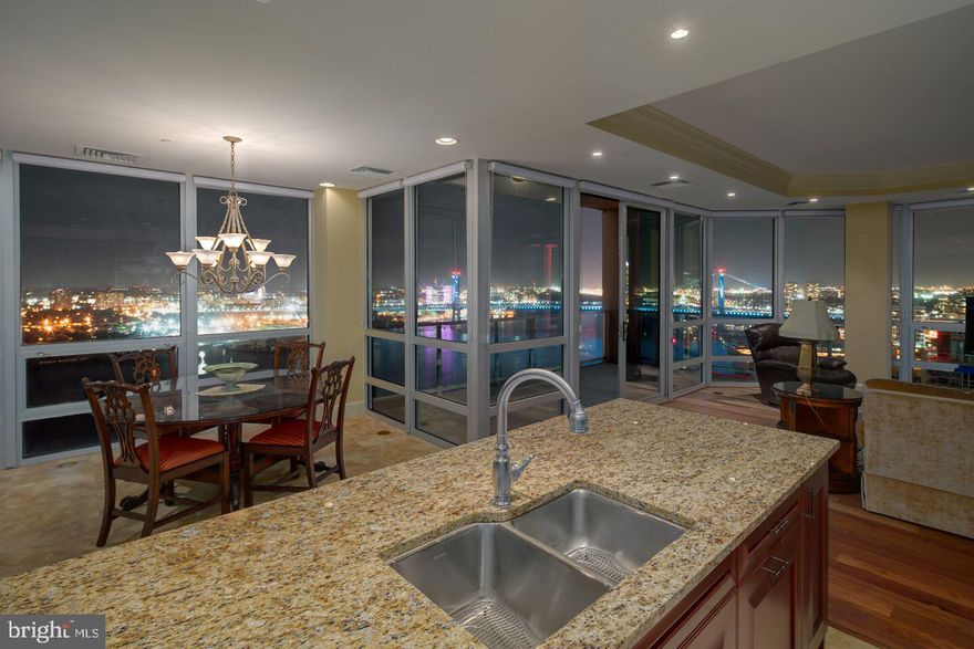 Unbelievable opportunity to own the half floor Waterfront estate in the sky that is Penthouse R2802 in the tallest building that Waterfront Square has to offer - The Regatta!  This dramatic 3,288 square foot Penthouse has sweeping panoramic SE corner, S, and SW corner views through floor-to-ceiling windows, showcasing unobstructed views of the Delaware River, Ben Franklin Bridge, and Center City Skyline!  Penthouse R2802 is a 3 bedroom, 3.5 bath unit with laundry room and oversized balcony, and is inclusive of TWO parking licenses and storage unit!  To gain entry to the 28th floor, one must swipe a specially programmed fob exclusive for this unit in the elevator.  Upon entering the double doors to Penthouse R2802, timelessly elegant Creme a Marfil marble extends to the periphery of the Grande foyer and halls, with beautiful built in granite shelving in the wall to display ones art collection.  The kitchen is a Chef's dream featuring the best appliances Wolf and Sub-Zero has to offer inclusive of Sub-Zero refrigerator, Sub-Zero ice maker, Wolf cooktop, Wolf oven, Wolf stove, and granite counters.  Upgraded cabinetry has both over cabinet lighting and under cabinet lighting; showcasing a beautiful tile backsplash with in-lay design.  What's remarkable about Penthouse R2802 is that the 3rd bedroom is situated in such a way with two sets of double doors ; one off the living room and one off the foyer.  The doors can be opened up so that the space can be utilized as either a flexible space like an additional seating/entertaining area, OR a bedroom by closing off the living room and foyer double doors.  The grand foyer, living room, master bedroom and second bedroom have deep tray ceilings, wrapped in double crown mulding, to really showcase the estate in the sky that it is.  Penthouse R2802 has a massive footprint, that is exaggerated by its 10 foot tall ceilings throughout the entirety of the unit.  Exquisite lighting fixtures inclusive of chandeliers highlight all the living and seating areas.  Master bedroom has an oversized walk-in closet with beautifully appointed wood built-ins.  The Mater bedroom also has an on suite 5 piece master bathroom with oversized soaking Jacuzzi tub that feels like a private sanctuary.  All the bathrooms are full marble, and many feature tranquil water views.  R2802 has SEVEN climate zones and even has a separate entry way for service!  Waterfront Square Condominium & Spa is a premier gated community offering 24/7 guard and gate, as well as concierge, valet parking, pool and hot tub with river deck, fitness center, sauna and steam room, massage rooms and community rooms.  There is a 3- level garage, with Philadelphia's largest green roof situated on top, inclusive of putting green!  Waterfront Square resides on a 9.5-acre riverfront enclave, with lush manicured outdoor common parks and gardens right on the river's edge.  Management is on site, and Waterfront boasts an advanced security system with closed-circuit television.  For your convenience, Global Limousine runs on site from 6:45am to 7:11pm M-F, taking residents as far as 30th street and back home to their gated community.  The river deck is oversized, encompassing a 25-meter heated lap pool (junior Olympic).  Waterfront Square has an excellent location, due to it's proximity to area highways & airports (676,95, all bridges), yet is nestled away on the Delaware River - the best of both worlds!If its unequivocal luxury, showcasing the best views in Philadelphia, littered with amenities, then it must be Waterfront Square Condominium & Spa!