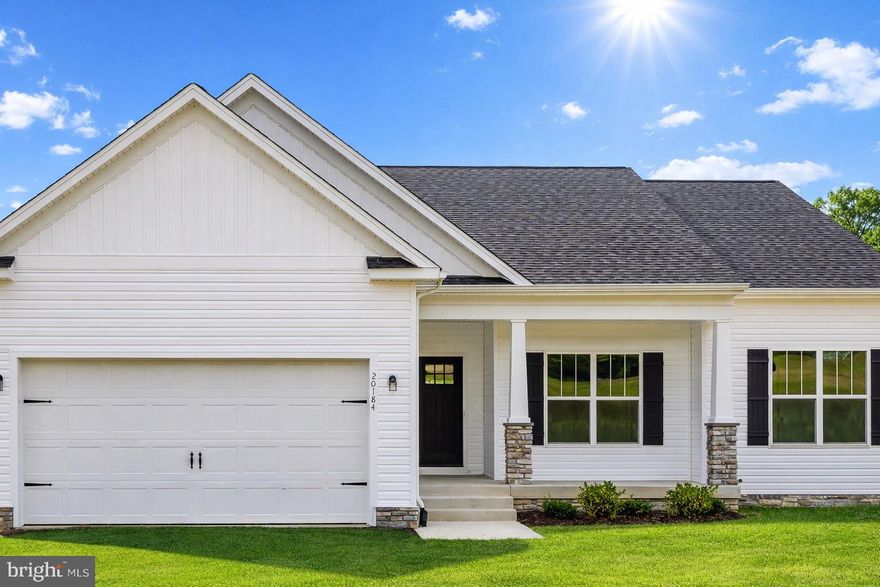 LAKE ANNA – WYNDEMERE LAKE COMMUNITY –YOUR DREAM HOME IS UNDER CONSTRUCTION. The Clayton model by award-winning Foundation Homes is currently under construction and scheduled for completion in mid-May 2026, just in time for boating season. This stunning ranch-style home with a fully finished walk-out basement offers over 3,300 square feet of living space, four bedrooms  and three full baths.  From the inviting craftsman-style front porch, step into an open-concept family room featuring soaring cathedral ceilings and luxury vinyl plank flooring throughout the main living areas. The gourmet kitchen is beautifully appointed with white shaker-style soft-close cabinetry, quartz countertops, stainless steel appliances, a wall oven, built-in microwave, cooktop range, and a spacious island ideal for cooking and entertaining. The main-level primary suite offers two closets, dual vanities, and a thoughtfully designed shower for a spa-like experience. A secondary bedroom and a flex room (not to code due to septic) complete the main level and offer versatility for guests or home office space. The fully finished lower level features an expansive recreation room, oversized media room, full bath, a large additional bedroom, and abundant storage. Enjoy peaceful evenings on the covered composite rear deck while taking in the tranquil natural setting, or take a short walk to one of the 3 marinas with a boat launch. Wyndemere is a sought-after lake community at Lake Anna, and offers many amenities for the whole family, waterfront picnic areas, basketball, tennis, and pickleball courts, 3 marinas, and boat slips you can lease annually.  It is ideally located, just minutes from shopping, dining, and popular local destinations including Lake Anna Winery, Tim’s, The Cove, Lake Anna State Park, and more. XFINITY Internet available!  *Photos are of a similar home and not exact; please see the Documents section for specific selections and finishes.