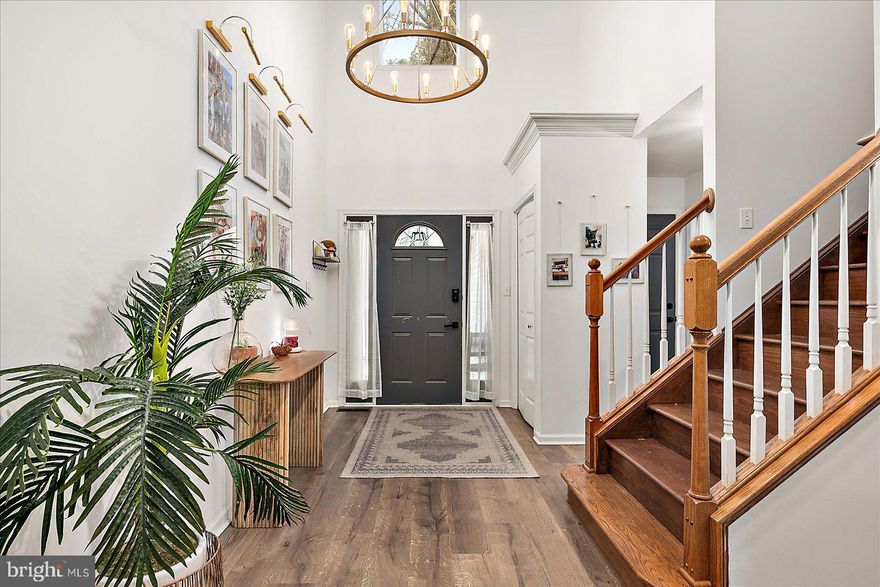 Stop by Saturday, April 18 for the OPEN HOUSE 11am-1pm and make an offer on this coastal beauty!  This home feels so custom, so grand and ready for you to kick off your shoes and relax. As you walk up you will notice the cool stone siding and all the interior upgrades including: the flooring (2022), the designer lighting and coastal cozy details of this home.  You are greeted with a dramatic vaulted ceiling in the living room, complete with gas fireplace making this an entertainer’s dream. The oversized dining room off of the custom kitchen and breakfast area really provides ample space for all your needs. Updated appliances and washer/dryer were added in 2023. With 4 bedrooms, including the primary bedroom on the main floor, plus an additional 2nd floor rec room, you will have a room for everyone to unwind. Check out the attic space! Your 2-car garage is nicely epoxied (2022) and ready for all your beach gear! Updates include a new HVAC in 2026 and crawl space dehumidifier in 2024. At over 3000 square feet, this coastal beauty in South Ocean Pines offers community amenities including several amazing pools, tennis courts, a marina, yacht club, golf course, parks, trails and so much more! This is truly a must see!