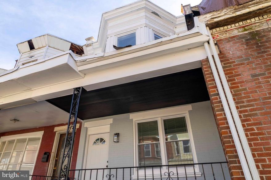 Pack your bags and move right in to this bright, beautiful modern home! This front porch home on a quiet West Philly block has been fully renovated from top to bottom so that you won't have to lift a finger. Step from the charming front porch into the open concept first floor where the spacious living room flows into a cozy dining area with convenient powder room. The brand new kitchen features white cabinets with stylish grey subway tile and stainless steel appliances. Downstairs, the basement is semi-finished, making it a versatile space for a secondary living space, play room, home gym, or movie room. The nicely sized patio is just through the back door.  Upstairs on the second floor, you'll find the full tile bathroom and three bedrooms. All three bedrooms feature ample closets and windows. The front bedroom is filled with light from the stunning bay windows. Other key features: All new electrical, plumbing, heating and central air, and water heater. Schedule your showing today!