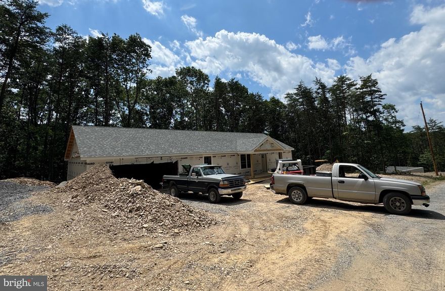 It's ALL New!  New Subdivision, New Home, New Beginnings!   Builder is breaking ground and has 3 lots and homes ready to start.  All homes will be at least 1400 sq. ft.  ranchers on 2 acre lots.  Only a short distance to Northwestern Pike makes this a country living site yet easy access.  LAKESIDE will have minimum cov. & restriction which will be added soon.  The Lake at the beginning of the subdivision will have community access for owners enjoyment.  Get your foot in the door and get your new home reserved!