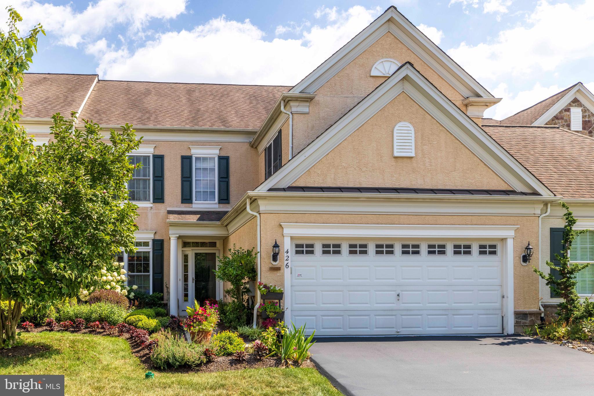 Living is easy in this fabulous 4 bedroom 3.5 bath carriage home in the popular Reserve at Gwynedd 55+ community. This beautifully updated Fulton model offers a well-planned layout. The welcoming entrance brings you into the home with a formal dining room with tray ceiling on the left. Straight ahead is the beautifully updated kitchen with white cabinetry, quartz countertops, and stainless-steel appliances including a convenient double oven. The kitchen opens to the adjacent breakfast area. The large living room has a dramatic vaulted ceiling and gas fireplace framed with handsome millwork. A lovely sunroom extends from the living room with glass doors that open to a private patio. The well-appointed primary suite is conveniently located on the main floor. It includes a stunning bathroom and large walk-in closet. A split staircase leads to a second ensuite bedroom with full bath and walk in closet to the right. To the left is a large loft/den which overlooks the living room, two additional large bedrooms and a full bath. All closets in the home have been professionally organized making storage a breeze. The 2-car garage has built in storage and an attractive epoxy floor. Convenient overflow parking is close to this home which is helpful for guests. The community offers an extensive clubhouse with a game room, living area, billiards room and more. There is an outdoor pool as well as an indoor pool, gym, exercise room, activity room and locker rooms with saunas. The community is conveniently located with easy access to main roads, SEPTA, terrific restaurants and shopping. The HOA takes care of many things you had to deal with before smart-sizing, giving you more time to enjoy the things you love to do. Call today to see this very special home and get ready for a wonderful lifestyle.