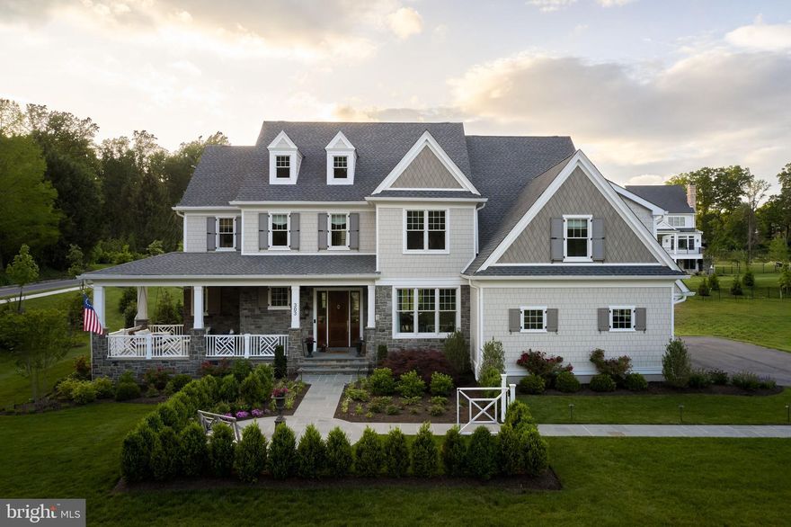 Model Home For Sale - Your story starts here in this fully custom 5-bedroom, 4.5+ bath, 3 car sideload garage, model home by FLH, offering 5,400 sq. ft. of meticulously crafted living space on a .98-acre lot. Nestled in a sought-after Main Line location, this home is within walking distance to downtown Wayne’s premier dining and shopping and falls within the highly rated Radnor Township School District. This one-of-a kind home will be ready for a Summer 2025 move-in.

The elevation blends historical charm with modern elegance, featuring Hardy siding, a mahogany front door, and an inviting front porch with a seated swing, perfect for enjoying tranquil nights. Manicured landscaping and a bluestone walkway complete the picturesque curb appeal. The remarkable outdoor living carries to the backyard with a covered bluestone patio featuring a wood burning fireplace and opens to even more bluestone entertaining space with a well-appointed outdoor kitchen. 

Step inside the grand two-story foyer, where a stunning chandelier and a white oak tread staircase with wainscoting set the tone for the home’s refined design. The first-floor features 10-foot ceilings and a formal dining room, adorned with imported wallpaper and elegant wall sconces, leads to a sophisticated butler’s pantry featuring a Virginia mist honed countertop, bistro shelving, a Subzero beverage center, and a Scottsman paneled icemaker.

The designer kitchen is a masterpiece, boasting 60” Village Handcrafted cabinetry, Calcutta Lincoln honed countertops, brass hardware, a Kohler cast iron sink, and Visual Comfort statement lighting over the island and breakfast area. High-end Wolf Subzero appliances, along with a spacious hidden pantry, make this kitchen top of the line and beautiful.

The light-filled great room offers an elegant gathering space through the impressive wainscotting, coffered ceiling, and a 42" gas fireplace with a Zimmer mantel. A private study with built-in cabinetry and detailed trim work provides the perfect home office or library.

Designed for everyday ease, the family entry features board and batten millwork and built-in cubbies for organized yet beautiful storage, while two powder rooms—one off the family entry and another near the foyer for guests —add convenience and class. 

The owner’s suite is a serene sanctuary, featuring a vaulted ceiling with exposed beams and dual custom walk-in closets, each thoughtfully designed with bespoke storage and a refined vanity area. The spa-inspired bath is exceptional by offering dual vanities, a freestanding Kohler soaking tub, and a spacious tiled walk-in shower with a luxurious rain showerhead, all set atop radiant heated tile floors for ultimate luxury. The second floor is completed by 9-foot ceilings, three additional beautifully appointed bedrooms, three full baths, laundry room, and a versatile bonus room, perfect for a private guest retreat or personalized living space.

The finished basement expands the home’s living space by 1,300 square feet, featuring 9-foot ceilings, an elegant powder room, luxury vinyl plank flooring, and a thoughtfully designed, versatile layout ideal for any entertaining need. A dedicated gym area, enhanced by a mirrored wall and French doors, provides the perfect setting for wellness and relaxation.

This unparalleled home is the perfect blend of character and grandeur down to every curated detail right in Wayne. Schedule a tour today or contact an FLH Sales Representative for more information on this amazing opportunity.