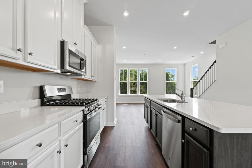 Brand new 4 bedroom, 3.5 bath craftsman style end unit townhome in the beautiful Potomac Shores neighborhood. This home offers a great space for entertainment on the rear trex deck or move inside to the expansive main floor with 10 foot ceilings in this one-of-a-kind Kendry Model. The first floor offers a bedroom, closet and a full bath perfect for guests! Beautiful kitchen features quartz countertops, stainless steel appliances and a center kitchen island with plenty of seating. Great size laundry room located on the bedroom level for added convenience. The owner's suite is beautifully appointed with a tray ceiling, walk-in closet and master bath offers double sinks, and a large stand-up shower with modern wall tile. The rest of the upstairs is just as magical, with 2 spacious bedrooms, all with great size closets and ceiling fans. This  community has over 85 miles of river surrounded walking trails. Your HOA fee covers INTERNET, gym, trails, snow removal and trash pick up. Potomac Shores is an amenity filled community including opportunities to bike, walk, swim, golf, workout, boat or enjoy a seat at the Golf Club Restaurant with friends. Take the VRE train (coming 2022) to DC and conveniently back to your home sweet home. This is a must see!