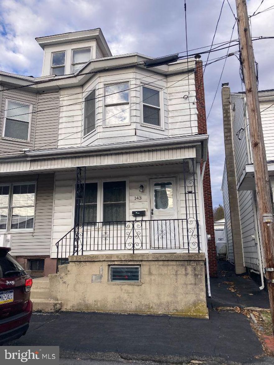 Solid semi detached in need of some updating, but move-in condition, just waiting for that new owner to bring it back to life.  Beautiful  colonnades between open livingroom diningroom area.  All great room sizes.  Fenced yard.   Attic is finished and was used as additional bedroom.  This home has greater potential, and its affordable!