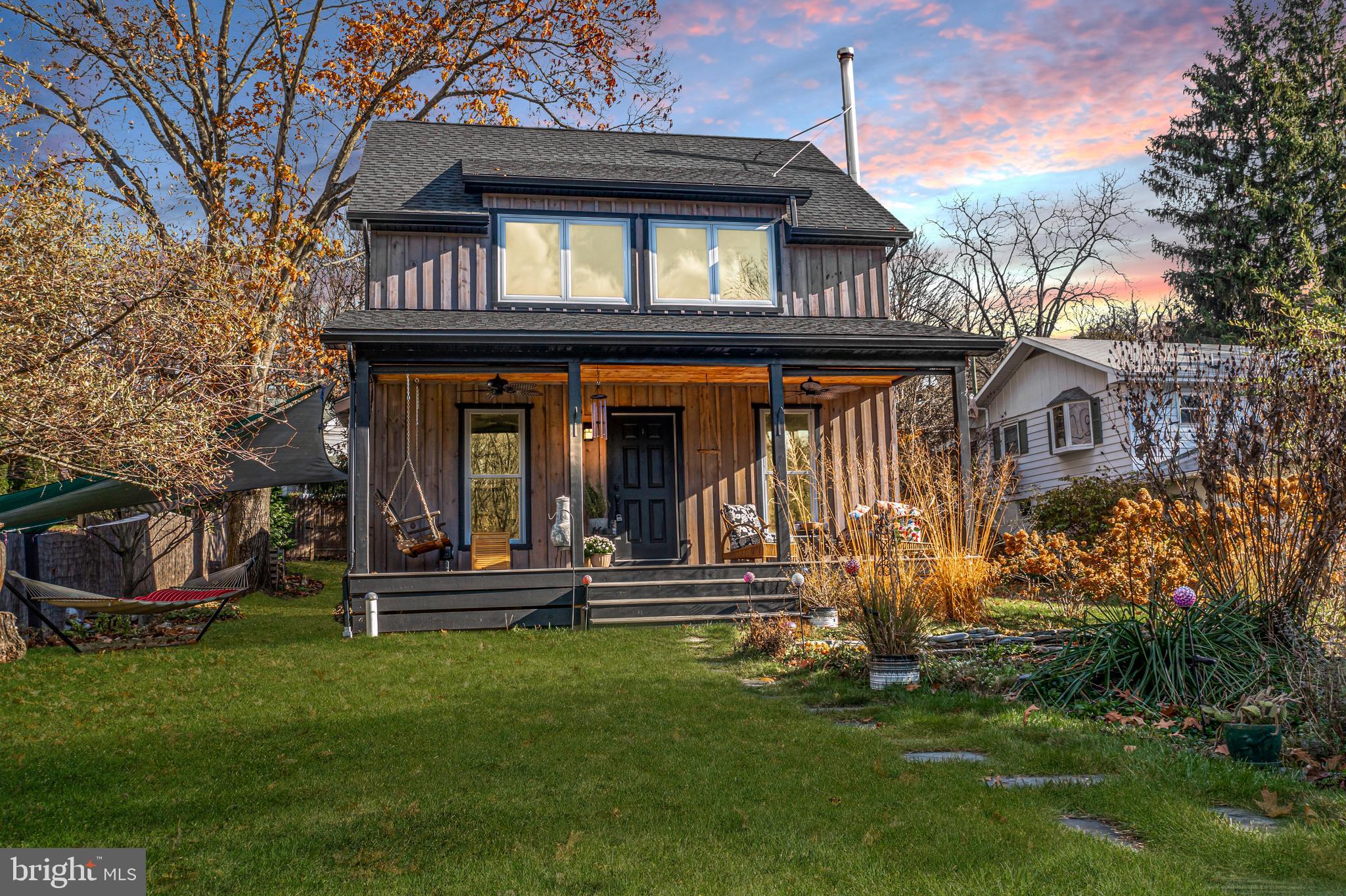 Step into the charm and warmth of this custom-built, 2-story home that exudes character at every turn. With only four years under its belt, this abode boasts a timeless appeal that will captivate your heart. As you enter, be greeted by the inviting atmosphere created by heated bamboo floors that flow seamlessly throughout. The open floor plan effortlessly connects each space, allowing for easy navigation and an airy feel. A cozy wood burner beckons you to gather around on chilly evenings, creating a sense of comfort and tranquility. The kitchen is a culinary haven with its island and granite countertops, providing ample space for meal preparation and entertaining loved ones. Upstairs, a loft awaits your imagination - transform it into an office or reading nook to suit your lifestyle. The second level houses two bedrooms adorned with window seats that invite daydreaming as you soak in the natural light pouring through. A full bath with a walk-in tile shower completes this private sanctuary where relaxation takes center stage. Outside, bask in the serenity of nature on the large open front porch while savoring peaceful moments amidst lush surroundings. A pond adds an element of whimsy to the landscape while perennials paint vibrant hues across the canvas of your backyard retreat. For those seeking solace look no further and make your appointment today to see this truly one of a kind home!