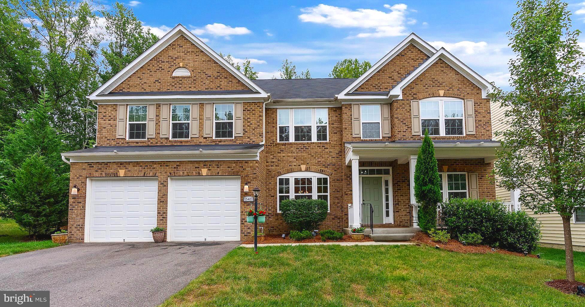A Balmoral beauty that is sure to please! This home is only six years young, has been lovingly maintained by the original owners, and the remainder of the builder's 10-year structural warranty conveys. The popular Versailles Model was NVR/Ryan Homes' largest home available in the community with over 6,500 square feet of space. A quaint covered porch is your first greeting upon visiting. Once inside you will find a floor plan with multi-generational living in mind featuring a main level en-suite with a custom built-in wardrobe and an easily accessible stall shower. The main level layout is a traditional center hall design with the living and dining rooms accented by structural columns. The rear of the main level opens to soaring 18' ceilings in the family room, which features wide plank engineered wood flooring, a gas fireplace, a ceiling fan, LED lighting, and a picturesque view of the wooded open space to the rear. The family room leads to a covered deck that is ideal for fresh air and relaxation - rain or shine. The kitchen adjoins the family room and is divided by a large prep island and breakfast bar, seemingly endless cabinet and counter space, stainless steel appliances, double oven, built-in microwave with external venting, and subway tile backsplash. The shaker style cabinetry is tastefully finished in light gray. The rear entry hall from the garage includes a convenient arrival center with bench, storage, and coat hooks, a powder room, a sizable planning desk and cabinetry, and a large walk-in pantry. The doors from the kitchen lead to a hard-scape patio, a fenced yard, and plenty of privacy - courtesy of the community open space to the rear and side of the property. A direct-set oak staircase with wrought iron balusters transports you to quite the surprise on the upper level - a fabulous 23' x 19' loft area that is ideal flex space for whatever you desire - big screen TV, pool table, etc. There are four additional bedrooms and three full baths on this level. The primary bedroom has an attached sitting area and dual walk-in closets that feature custom closet organizers. The primary bath includes a large shower with a seat and double vanity. Each of the remaining bedrooms has a sizable walk-in closet, and one of the bedrooms is another private en-suite. The lower level consists mostly of finished recreational space; with an additional unfinished area should you wish to expand even further. There is another full bathroom on this level, along with a study/lounge room for your more intimate gatherings. The lower level is externally accessible via a side door and stairs that lead to the driveway. The Balmoral Community is a series of cul-de-sacs and non-through streets, so traffic is minimal past this home. The community recreation center features a large outdoor pool, exercise room, and meeting space. A commute into DC takes approximately 30 minutes, 35 minutes to Annapolis, and 20 minutes to Joint Base Andrews. Shopping recently became much more convenient to the Balmoral community with the opening of the brand-new Giant Food-anchored South Gate shopping plaza, only a short 10-minute drive to the north.