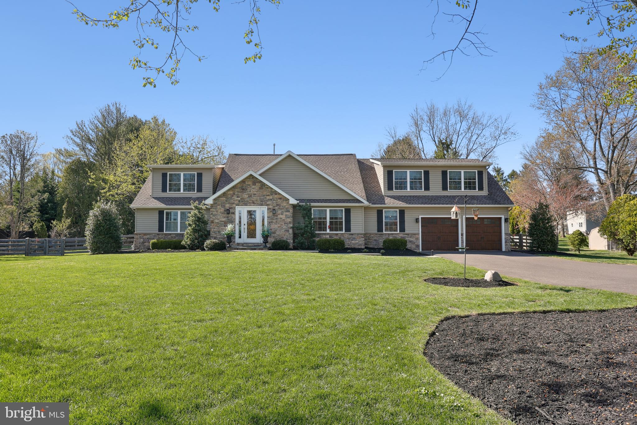 Completely rebuilt from the ground up in 2020, this exceptional 4-bedroom, 3-full, and 1-half-bath home blends timeless elegance with modern design. Set on 1.5 picturesque acres, it offers the perfect combination of luxury, comfort, and functionality.
Inside, you'll find two spacious primary suites, ideal for multi-generational living or added guest privacy. The open-concept main living area is an entertainer’s dream, featuring custom cabinetry, quartz countertops, top-of-the-line stainless steel appliances, a walk-in pantry, and a seamless flow between the kitchen and living room. A state-of-the-art gas fireplace with backlighting adds a cozy, modern touch.
Solid 3/4” hickory hardwood floors run throughout the home, complemented by craftsman-style trim, crown molding, and a premium LED lighting package. Generously sized secondary bedrooms share a beautifully appointed bathroom with custom tile work and dual vanities.
Additional upgrades include:
Solid core interior doors
Energy-efficient windows
High-density insulation
Modern septic system (installed in 2020)
The finished basement is a showstopper, offering a fully equipped gym, stylish movie area, and custom bar. Outdoors, you'll find a private oasis with a hot tub, fire pit, fully fenced backyard—ready for a pool—and an expanded driveway to accommodate additional parking.
Located in the award-winning Central Bucks School District, this home is within walking distance to Hansel Park via a private gate in the backyard and just minutes from the shops and restaurants of downtown Doylestown.