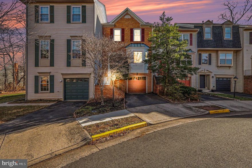 Tucked into Ashburn Village and backing to a peaceful stretch of common area, 44102 Gala Circle offers the kind of everyday livability that’s hard to find in a townhome: a private, fully fenced yard, bright interior spaces, and thoughtfully updated finishes throughout. From the moment you step into the open entry, you’ll appreciate the luxury vinyl plank floors on the main level and the natural light that carries through to the charming bay-window living room and adjoining dining area, ideal for both quiet nights in and easy entertaining.

At the heart of the home, the kitchen delivers clean, timeless style with quartz countertops, crisp white cabinetry, stainless steel appliances, and classic subway tile. The breakfast room keeps everyone connected, whether you’re hosting or simply catching up at the end of the day. Step out to the deck for morning coffee or an evening reset while overlooking the calm, tree-lined backdrop. 

Upstairs, the primary suite feels airy with vaulted ceilings, two closets, and an en-suite bath featuring granite counters and dual sinks. Two additional bedrooms share a well-appointed hall bath, creating flexible space for guests, a nursery, or a dedicated work-from-home setup. The walk-out lower level adds even more room to spread out: cozy up by the gas fireplace or customize the space as a rec room, media lounge, or home office, all with convenient access to the backyard.

Practical upgrades include a new HVAC in 2022, and new flooring throughout the main level and rec room. Enjoy the convenience of a 1-car garage plus ample nearby parking for visitors. And the lifestyle here is hard to beat: minutes to One Loudoun and Ashbrook Commons, and all the benefits of Ashburn Village: paths, playgrounds, marina, community events, and access to the Sports Pavilion with indoor/outdoor pools, a full gym, tennis, racquetball courts, and spa-like sauna and steam room. Don't miss this stunning property!