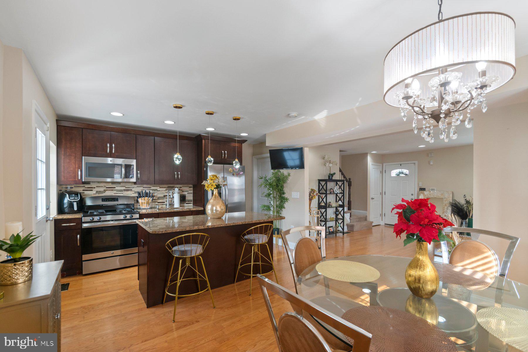 Welcome to this stunning, recently renovated end-of-group town home offering modern living with classic charm. Boasting 4 spacious bedrooms and 2 full bathrooms, this home is move-in ready and showcases high-end finishes throughout.
Enjoy an open-concept main level with abundant natural light, updated flooring, and a sleek, modern kitchen featuring stainless steel appliances, granite countertops, a kitchen island, and stylish cabinetry. The fully finished basement provides an additional bedroom, and living space perfect for a family room, home office, or guest suite—complete with a full bath for added convenience.
Additional highlights include a private rear parking pad, and privacy fence that offers added privacy. Located in a desirable neighborhood with easy access to Morgan State University, shopping, dining, and commuter routes, this home is a must-see!