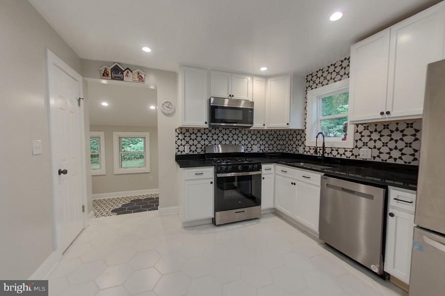 BACK ON THE MARKET!!! PENDING RELEASE.  Looking or LAND and SPACE.  Well you got it here.  Lots of growth and privacy with this property.  You can make this your own getaway in the heart of the city.  This beautiful recently renovated home in Oxon Hill is a must-see! With four bedrooms and two bathrooms, this home offers plenty of space for a family or roommates. The master bedroom features a luxurious walk-in closet and master bathroom, offering a private retreat from the rest of the house.

The open floor plan makes this home perfect for entertaining, with a seamless flow from the living room to the dining room and kitchen. The large entryway/mudroom is perfect for kicking off your shoes after a long day, and the finished basement provides additional space for a home office, game room, or family room. The upgrades throughout the home are sure to impress, including new flooring, appliances, cabinets  and countertops. 

Located on a quiet street in a friendly neighborhood with tons of privacy, this home is just minutes away from shopping, dining, and entertainment. Don't miss out on the opportunity to make this beautiful home yours! Agent Owner.  NO HOA!! CONTACT US TODAY!!