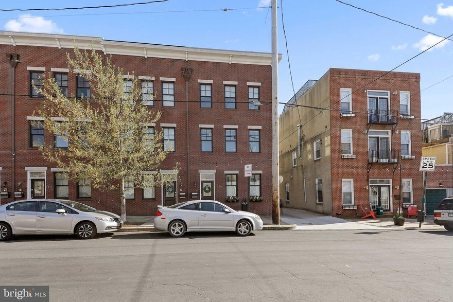 Gorgeous End of Group townhome with 2 car GARAGE in Canton! Bedroom/office with murphy bed, laundry room, and one of the home's four recently renovated baths are found on the entry level. Hardwood steps with wrought iron rails. Gourmet kitchen with 11 foot island with seating for 5, white cabinets, granite counters and stainless steel appliances. Living room with gas fireplace, dining room, half bath, hardwood floors, updated balcony, recessed lighting and side windows on second floor. Spacious primary bedroom with two walk-in closets with custom built-ins, en suite bath with stand up shower and double vanity. Additional bedroom with balcony, renovated bath with tub and double vanity. Roof top deck features new surface tiles while you enjoy water views! All ceiling fans, light fixtures, kitchen backsplash, cabinets, bedroom sliding glass door and living room french doors have been  updated between 2020 and 2021. Dual zone HVAC systems updated in 2018.