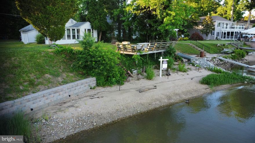 **INVESTORS SPECIAL-BEING SOLD AS IS" ESTATE SALE    Great opportunity to purchase a waterfront lot along the Bush River with your private sandy beach & plenty of room for a pier.  It is the perfect lot to build your dream home and enjoy the beautiful views every day.  MAJOR REHAB or tear down for new build.  Please be careful on the deck and stairs leading to the beach area and steps down to basement, very steep. Public water and sewer.