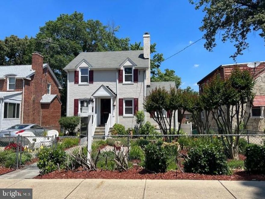 The seller is offering $5,000 in CLOSING ASSISTANCE!!!!! Seller has lowered the price and is highly motivated to sell quick!!  This property also qualifies for $5,000 to $7500 census track program.   The moment you lay eyes on this home you will love the well manicured yard.  The seller has taken great pride in  landscaping and curb appeal.  The front portion of this home has the appearance of a court yard and provides a complete fence.  This historic neighborhood  will charm you and your family.  The Colonial offers three  levels, 2 full baths, 2 bedroom. with a possible third bedroom in the the lower level.  Lower level could also be converted in to apartment, offers separate walk-out entrance.    Seller has remodeled the kitchen with custom cabinets, ceramic backsplash, Hardwood Floors, GE Profile stainless steel appliances, and Sal Stone countertops.  The main level has new engineered wood plank floors.  The parlor room can also be converted into an office or den.  The living room offers a wood burning fireplace, seller replaced the chimney flu in 2018.  The water Heater and air conditioner were also replaced in 2018.  Gas furnace was replaced in 2006 and is serviced yearly.  Entire home has custom wood blinds installed.  Roof was replaced in 2003.  The lower level bathroom was just recently remodeled and offer marble tile throughout.  The lower level has a large walk in closet and plenty of space for an additional bedroom.  You will appreciate the privacy the back yard offers with a new vinyl fence, the large deck is great for entertaining.  Additional storage in the attic area.  You will enjoy the hot tub and built in Barbeque for fun afternoon gatherings.  One of the few homes that offer an extended private driveway and a one Car garage.  NO HOA!!  Close to shopping, metro & minutes from DC & VA.  The purple Line is within walking distance. Seller will provide $5,000 in closing assistance.