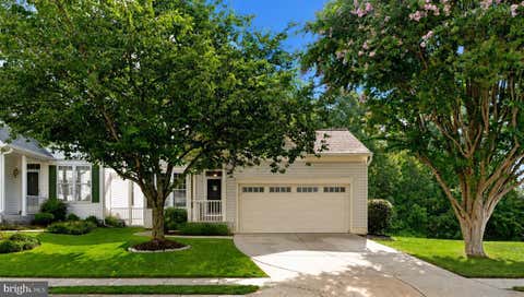 Photo of 6547 Creek Run Drive, CENTREVILLE, VA 20121 (MLS # VAFX2331630)