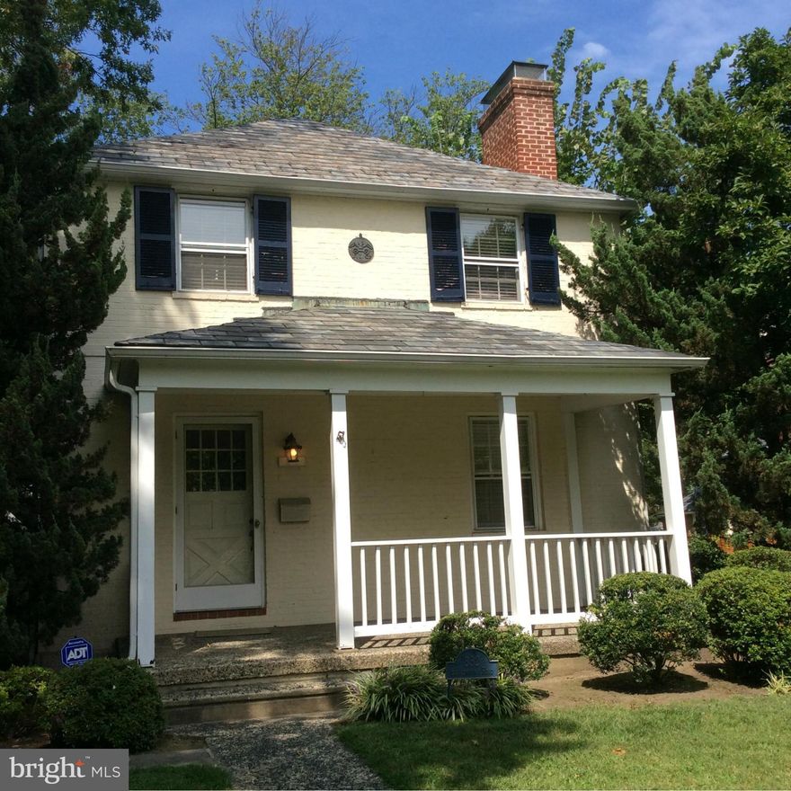 Enjoy the Character and Charm in this Traditional Painted Brick Colonial on tree lined street in Homeland. Move-In Ready. Spectacular deck and patio are part of an especially nice landscaped lot. All the amenities are here: Wood floors, fireplace, master bedroom and bath, finished lower level with additional bedroom/den and full bath, Central Air,  Covered Front Porch and garage/shed. 3 Full Baths