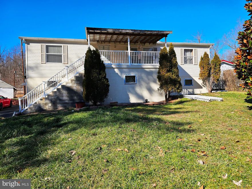 NEED SPACE? NEED LOTS OF BEDROOMS? NEED AN IN LAW SUITE? NEED A PLACE FOR AT HOME BUSINESS? WANT GARAGE SPACES? WANT TO RELAX BY AN INGROUND POOL? WANT ALL THIS IN A CONVENIENT LOCATION?  WELL LOOK NO FURTHER! LEAVE THIS SET UP AS AN UPSTAIRS UNIT AND DOWNSTAIRS UNIT OR TURN BACK INTO A SINGLE FAMILY HOME. UPSTAIRS FEATURES 3 BEDROOMS, 2 FULL BATHS, PORCH AND DECK, LAUNDRY ROOM, LIVING ROOM, AND KITCHEN/DINING AREA COMBINED.  DOWNSTAIRS (WALK IN LEVEL- NO STEPS) HAS LIVING ROOM, KITCHEN/DINING AREA, 1 AND HALF BATHS, LAUNDRY, AND UP TO 3 BEDROOMS. NOW STEP OUTSIDE AND YOU FIND AN INVITING INGROUND POOL, A 2 CAR DETACHED GARAGE, SEVERAL STORAGE AREAS, A BUILDING CURRENTLY BEING USED AS A WORKING HAIR SALON (HANDICAPPED ACCESIBLE) WITH ANOTHER 1 CAR ATTACHED GARAGE.  HAIR SALON SET UP FOR 3 STATIONS AND EQUIPMENT CAN STAY  FOR TURN KEY BUSINESS.