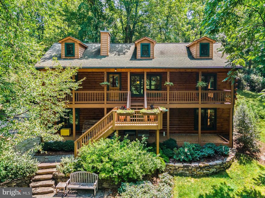 Custom log home  built in 2001 on 8+ Acres available in coveted Delaplane, Virginia. Enjoy end-of-the-road privacy and tranquility with the convenience of being within minutes of Historic Main Street, Marshall, VA and several wineries.  This home offers an Owner's suite, three additional bedrooms and three full bathrooms. Open concept great room and kitchen combination with cathedral ceilings. The main level porch awaits as you enjoy the view of the professionally designed with pollinators in mind and installed landscaping with drip irrigation system.  Additionally thoughtful features: High Speed Cellular Internet through T-Mobile 4G LTE (5G is on its way); Fenced animal proof 20' x 20' garden; Whole-House Surge Protector (Renewable, meaning it has modules that can be replaced if they fail - cheap systems aren't like this); Garage/Shop with extensive lighting and many additional electrical circuits; Kinetico Water Neutralizer & Softener Systems; Rinnai tankless water heater; New Stainless Steel kitchen appliances; New Carpet Throughout; Fresh Paint Basement Level;  RSF Zero-Clearance Fireplace, 5-6 cord of wood from your own property heats the house all winter; Logs stained last year; Driveway graded & graveled this year; Spectacular Blue Ridge Views in Winter.